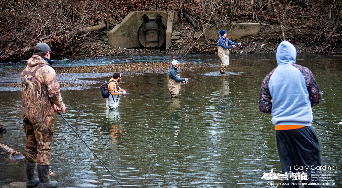 A quintet of fishermen tries both luck and skill as they fish for Muskie in flow below the Alum Creel Park low-head dam. My Final Photo for March 11, 2023.