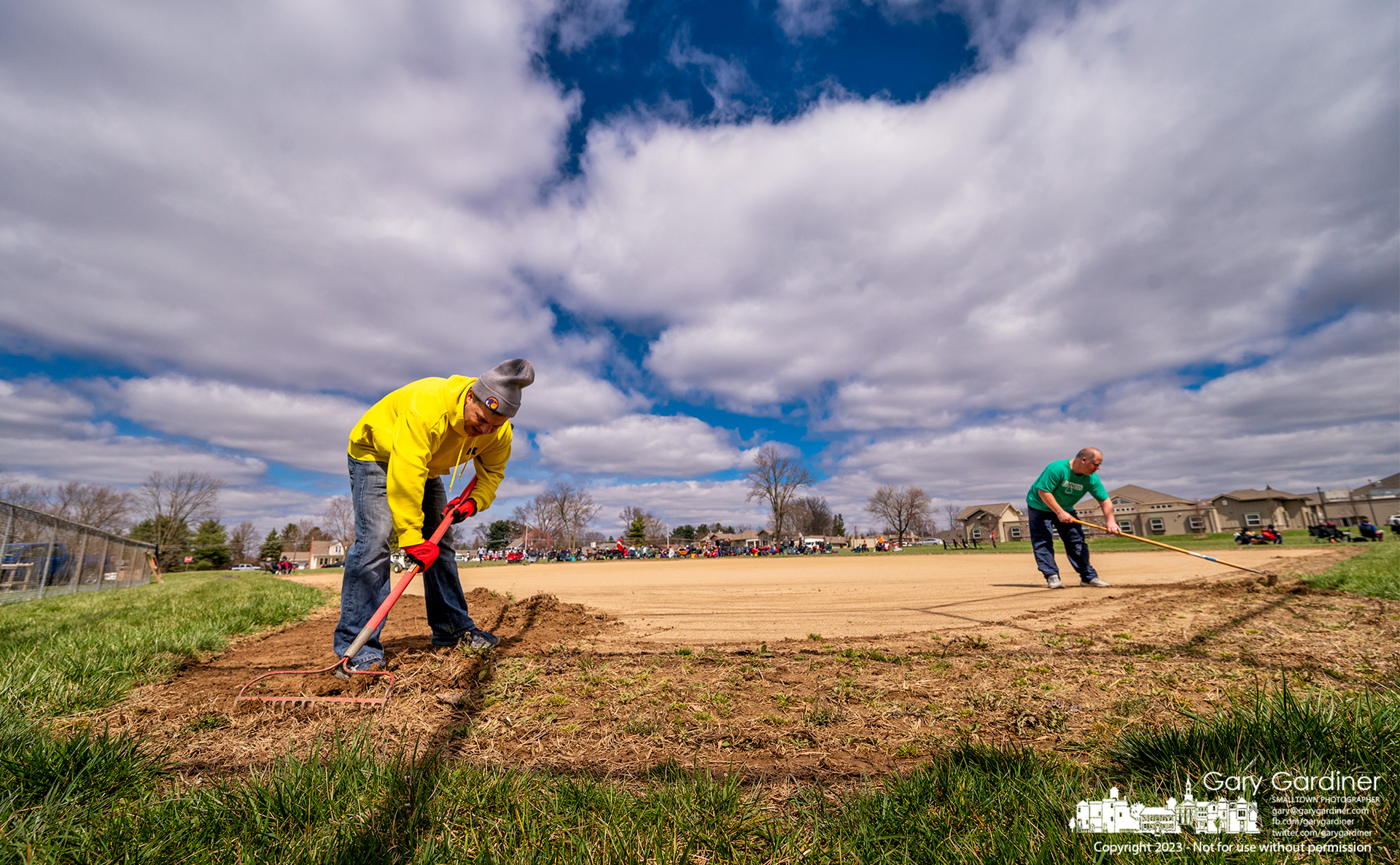 Volunteers clear weeds and overgrown grass from around the infield at the St. Paul baseball fields in preparation for the start of the season. My Final Photo for April 2, 2023.