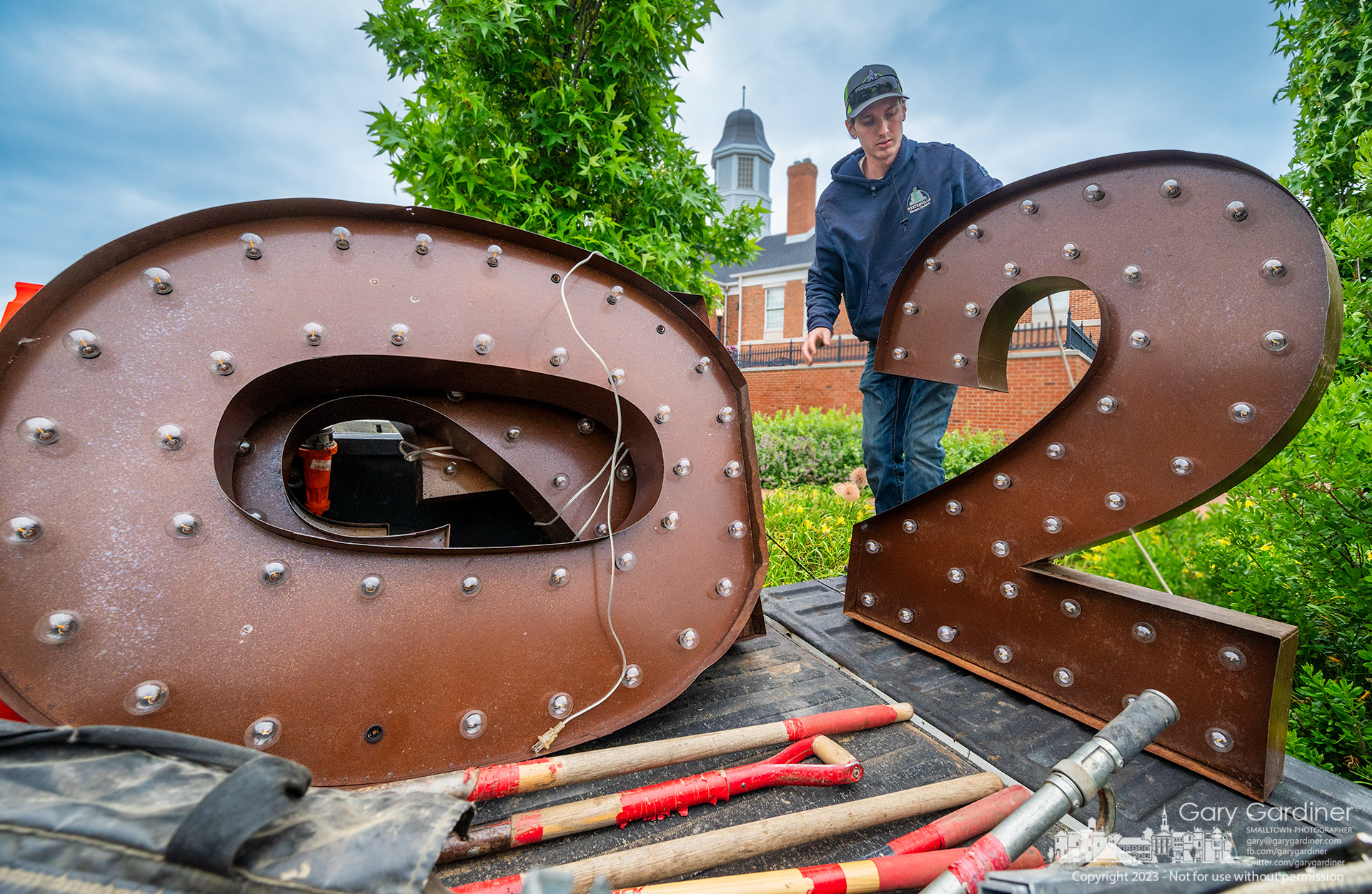 The lighted 2023 sign at City Hall, which marked the beginning of the new year and celebrated the graduation year of high school students in Westerville, is disassembled and removed after fulfilling its duty. My Final Photo for June 12, 2023.