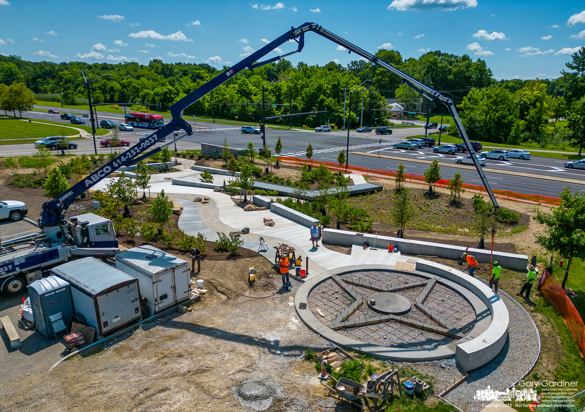 Concrete is pumped into a star outline at the top of the shallow stream that marks one corner of Sycamore Trail Park, built on Africa Road and dedicated to Westerville's history as part of the Underground Railroad. My Final Photo for July 31, 2023.