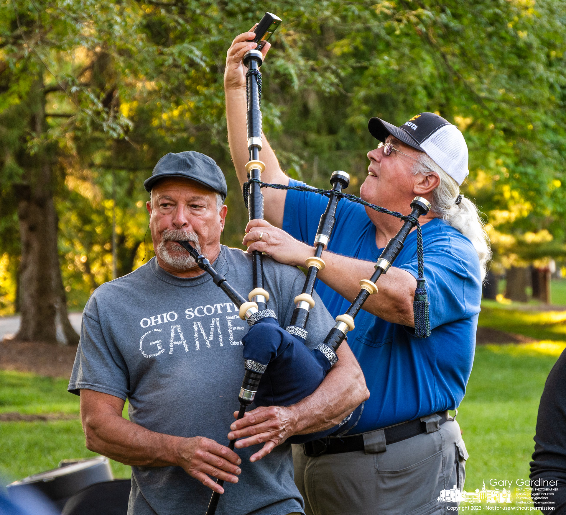 A bagpiper from the Capital City Pipes and Drums Corp gets his instrument tuned during rehearsal at Alum Creek Park North for an upcoming competition and performing during the Andre Rieu concert at the Schottenstein Center. My Final Photo for August 29, 2023.