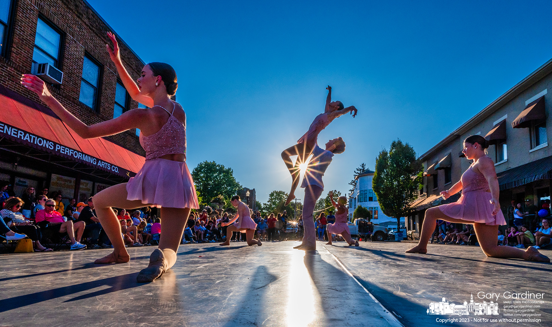 Generations dancers perform on West College against the setting sun on the last Fourth Friday of the season and the last day of summer. My Final Photo for September 22, 2023.