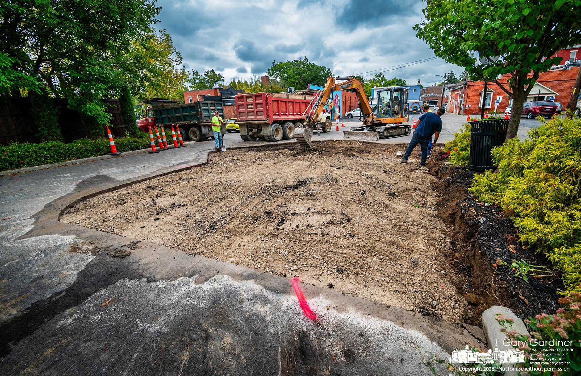 A construction team removes a section of the parking lot on Slaughter Alley to make way for the installation of new garbage containers that will be built partially below the surface of the parking lot. My Final Photo for September 26, 2023.