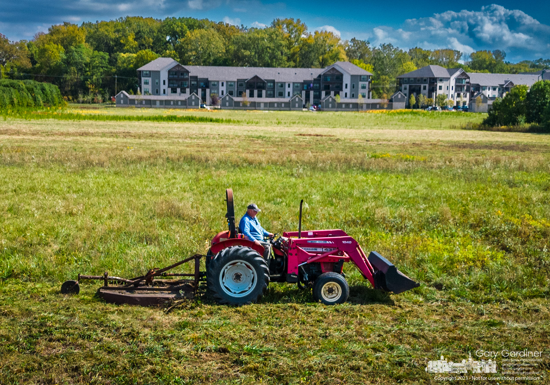 Farmer Kevin Scott mows a field preparing it for for parking for prospective students and their family visitation. My Final Photo for October 6, 2023.
