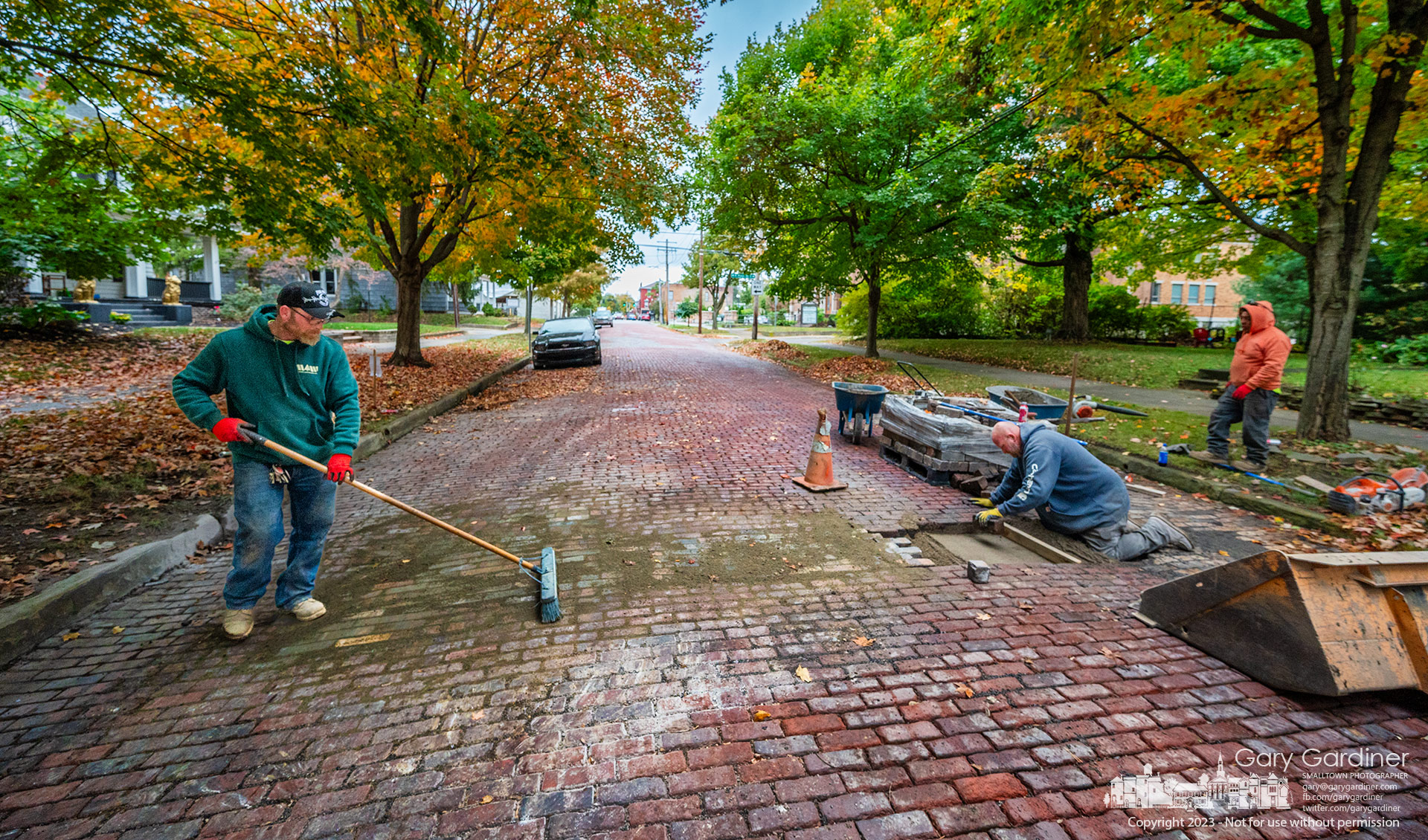 Street Sweeper - Bricks are returned to West College Ave. after new water lines were laid beneath the iconic street in Uptown Westerville. My Final Photo for October 16, 2023.