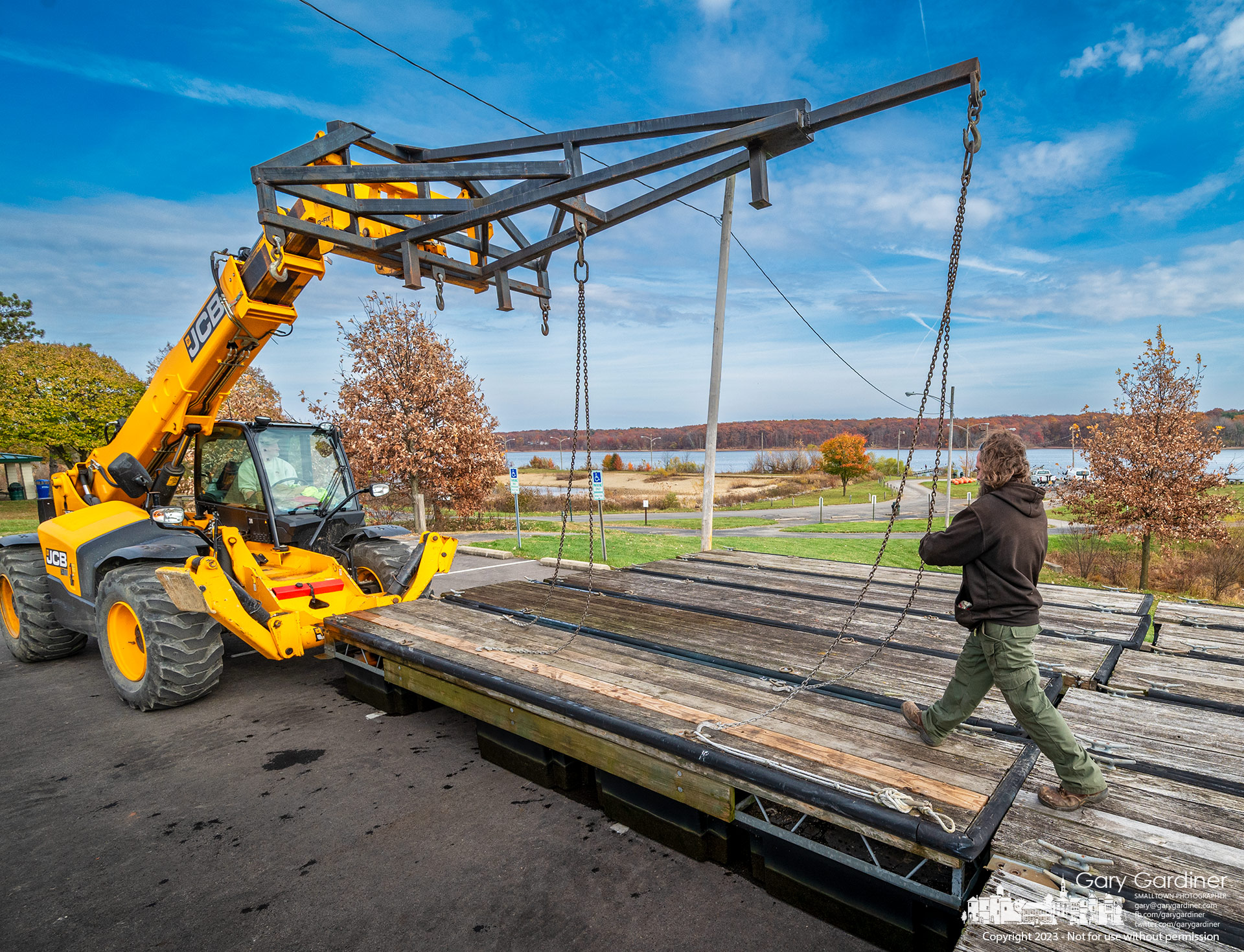 The last sections of floating docks are removed from Hoover Reservoir Wednesday finalizing the end of the summer boating season. My Final Photo for November 8, 2023.