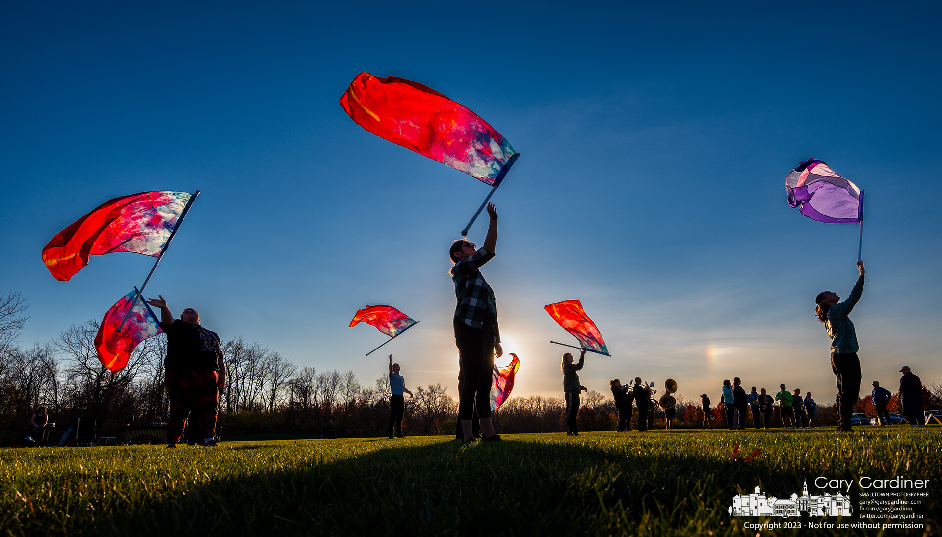 The Otterbein Marching Band and Flag Corp held its final practice of the year with a sundog rainbow adding a set of different colors to the sunset sky. My Final Photo for November 9, 2023.