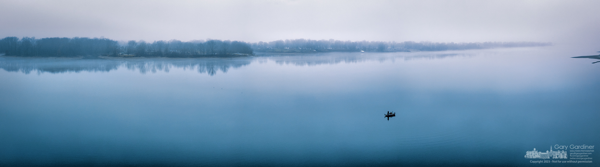 A lone fishing boat sits in the fog-shrouded still waters off Red Bank Park at Hoover Reservoir on Sunday morning. My Final Photo for December 24, 2023.