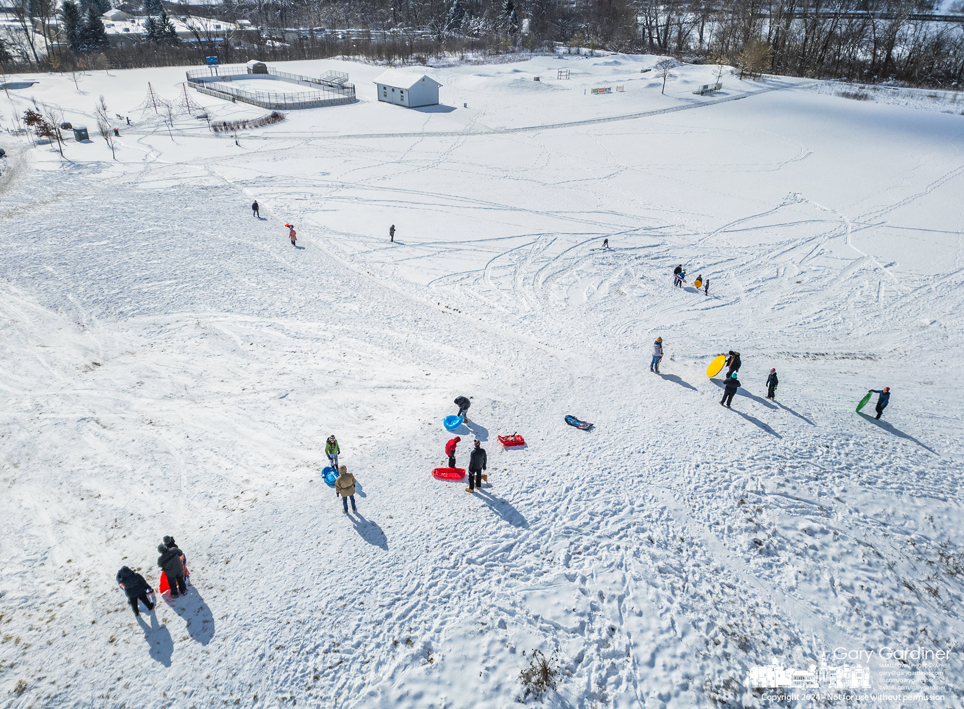 Sledders gather at the top of the snow-covered hill at Alum Creek Park South after an overnight storm brought seven inches of snow to central Ohio. My Final Photo for February 17, 2024.