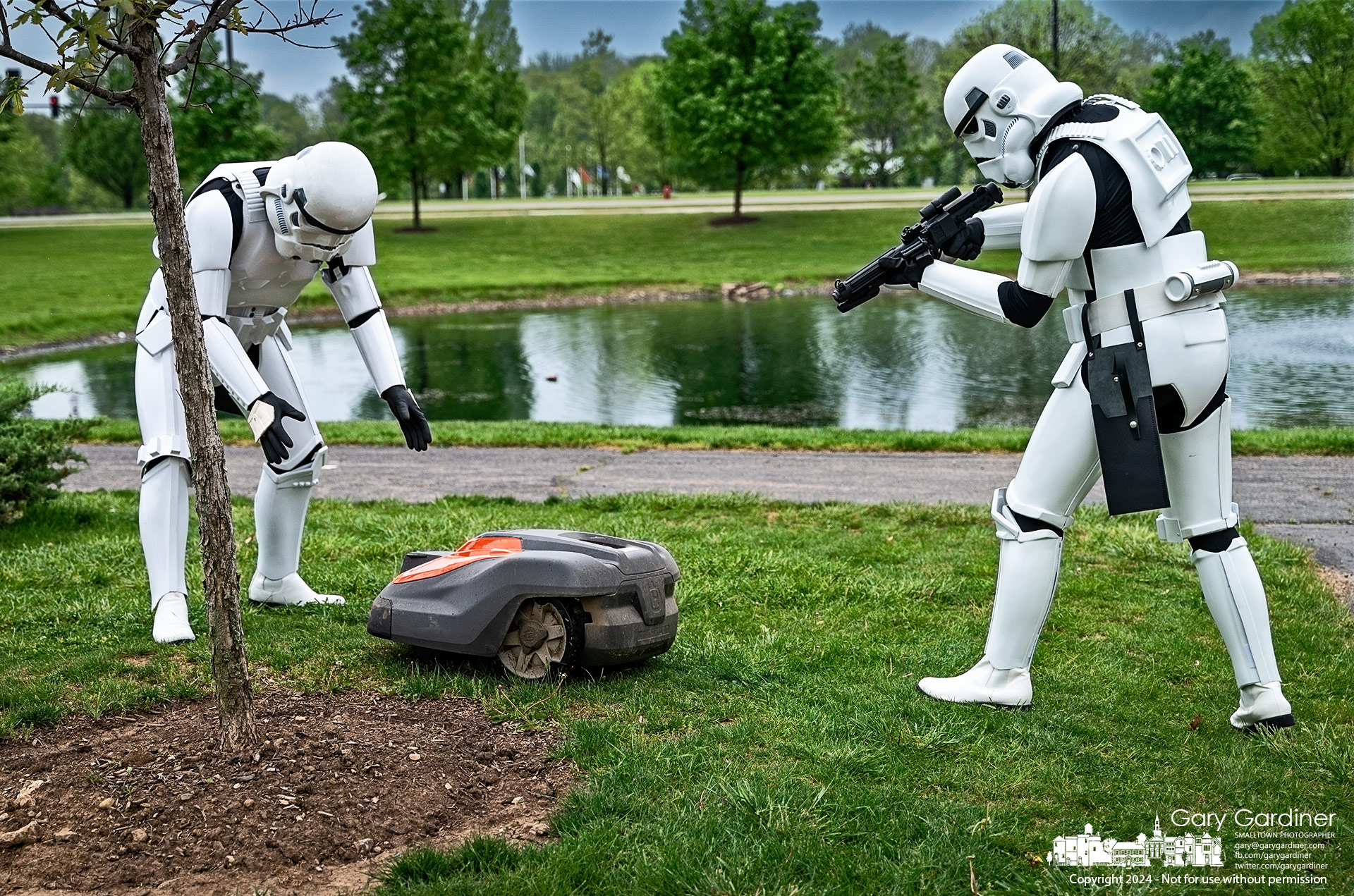 A pair of Stormtroopers attempt to detain a suspected Rebel Alliance Droid during a brief break from inspecting vehicles at the Westerville Parks Drive-Thru Droid Checkpoint at the Community Center Saturday, May 4th. My Final Photo for May 4, 2024.