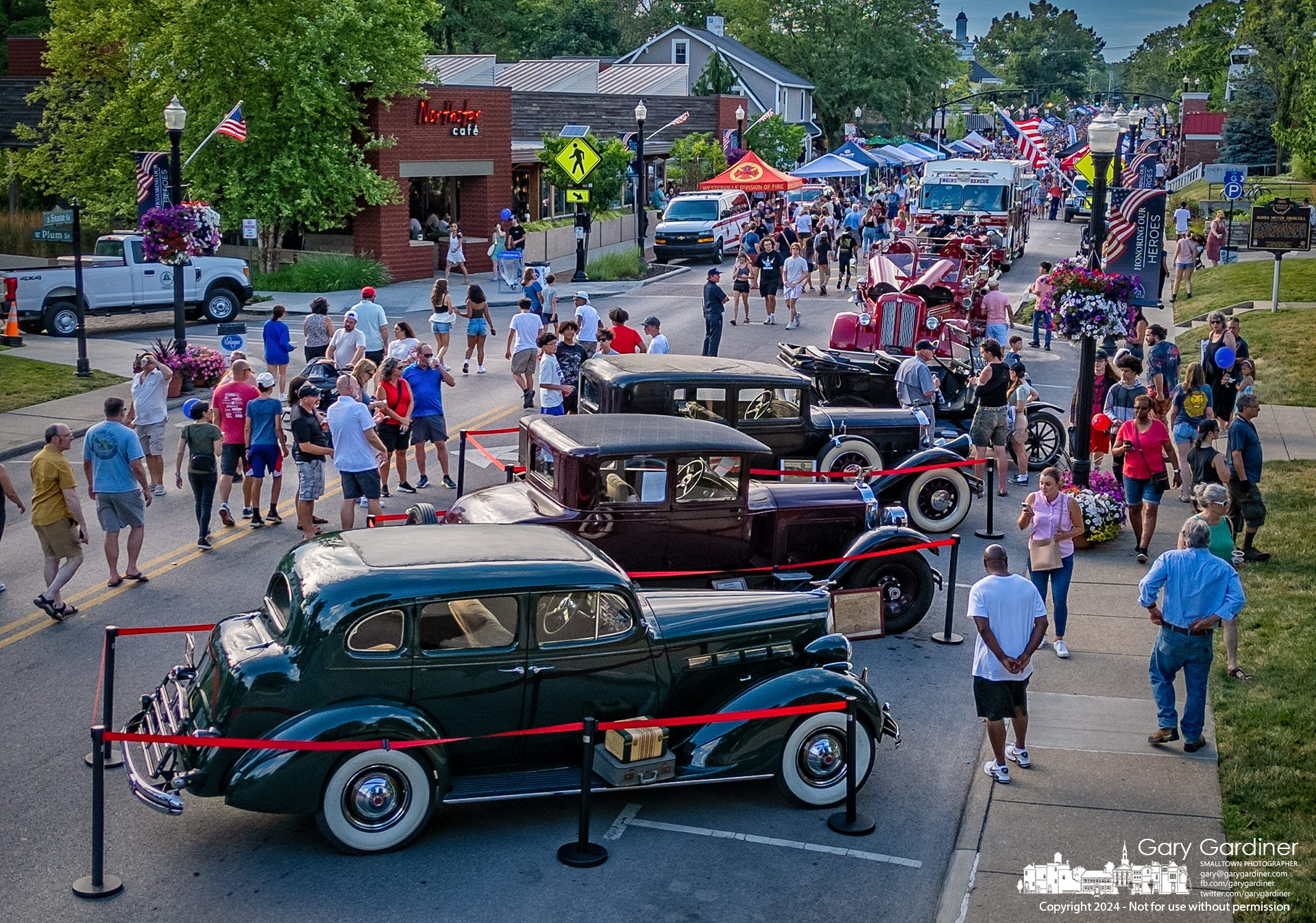 Vintage motor cars were parked on 3C Highway in front of the Westerville Library during Fourth Friday to commemorate the 100th anniversary of 3C's completion in the city. My Final Photo for June 28, 2024.