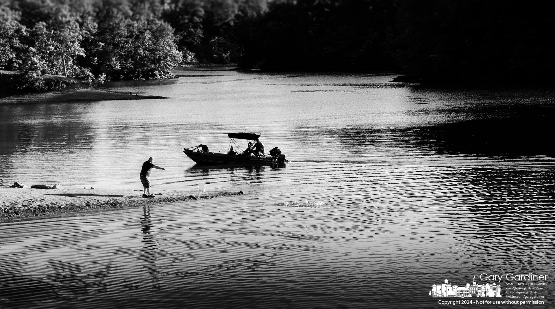 A fisherman casts for his bait as another returns to the Twin Bridges boat ramp on Hoover Reservoir late Saturday afternoon. My Final Photo for July 27, 2024.