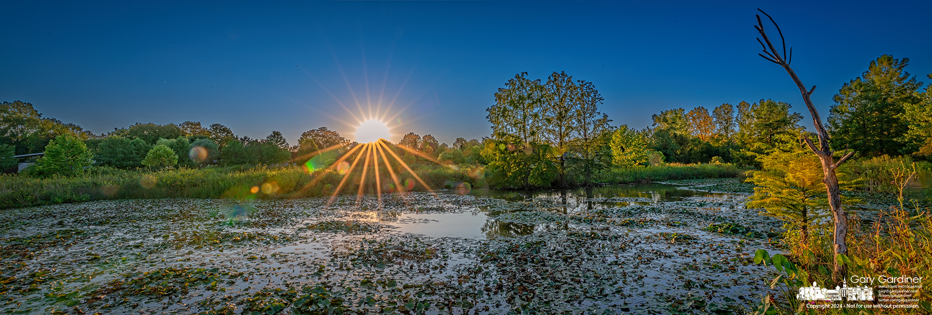 The setting sun strikes the horizon on the sports fields next to the wetlands at Highlands Park in Westerville. My Final Photo for August 29, 2024.