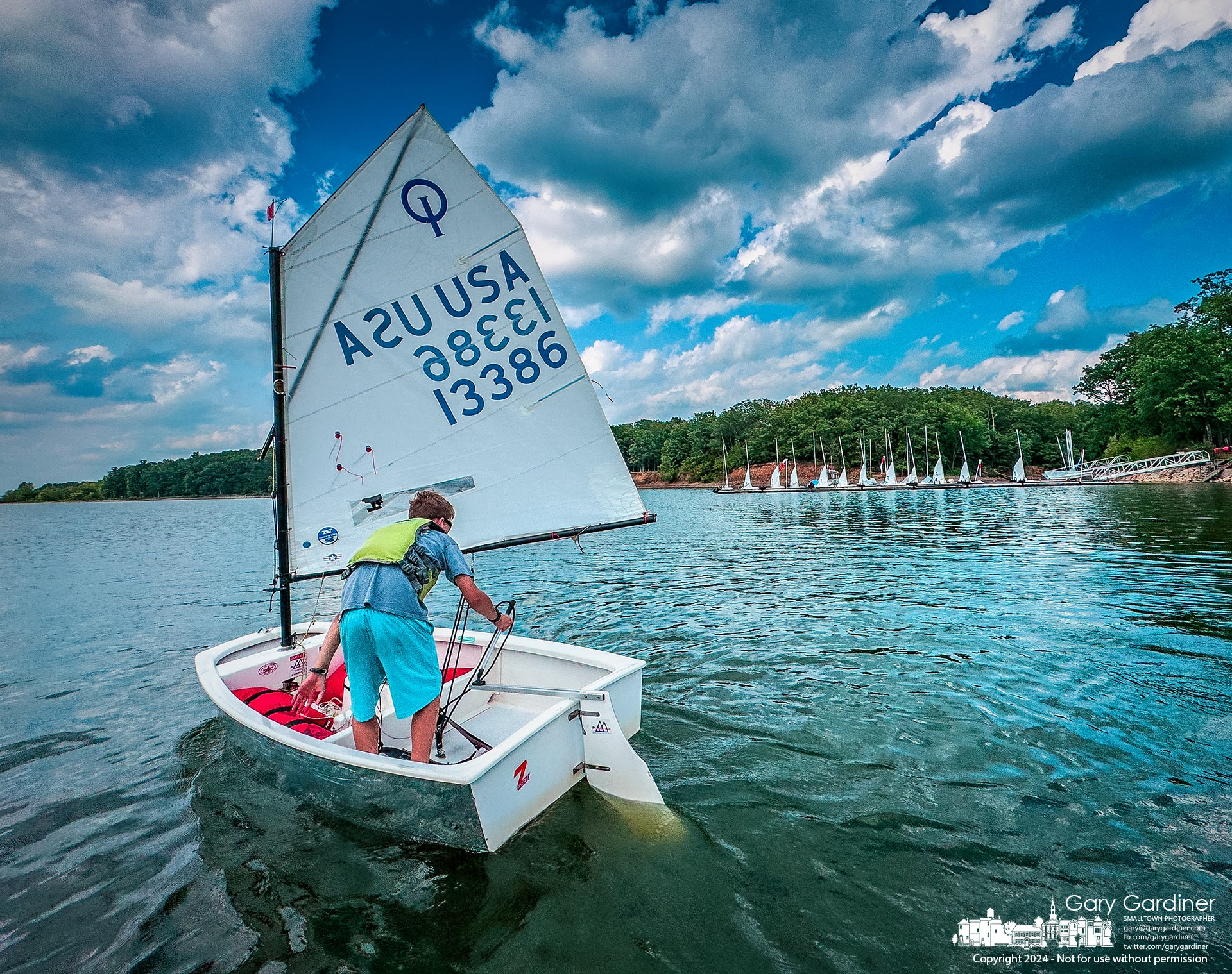 A young sailor takes to Hoover Reservoir after a rudder repair at the beginning of his class Thursday afternoon. My Final Photo for August 1, 2024.