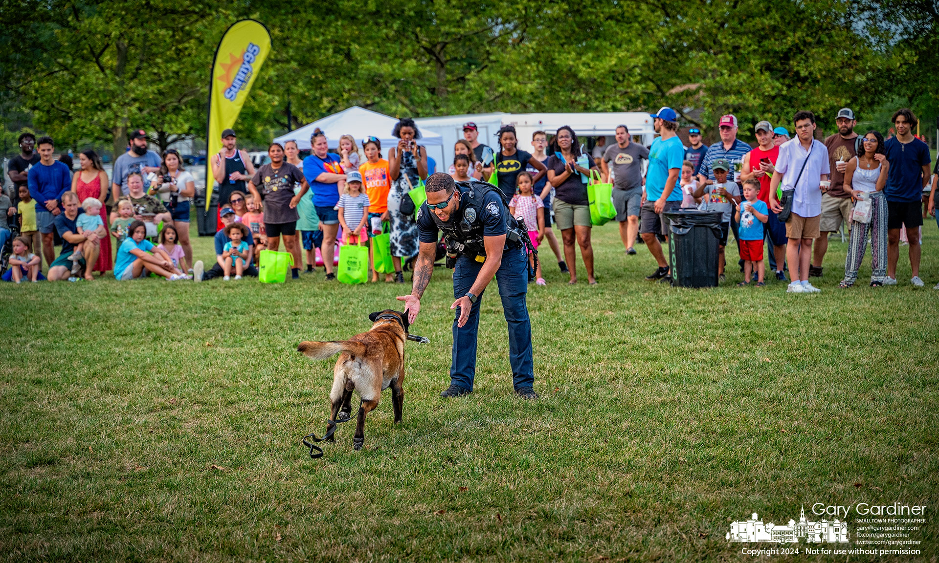 Westerville Police K9 Officer Kyrell Baggoo and Canine Officer Bruno demonstrate teamwork at National Night Out at Huber Village Park. My Final Photo for August 6, 2024.