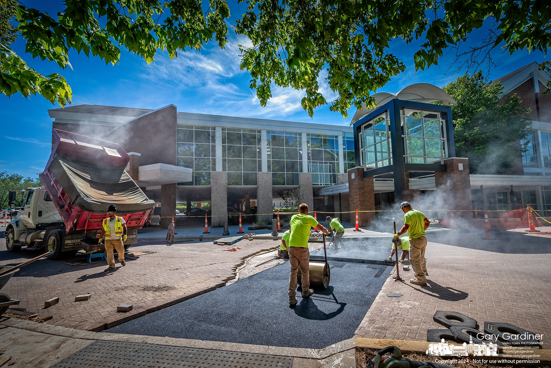 A layer of asphalt is leveled to make way for new brick pavers marking access to the rebuilt East entrance to the Westerville Public Library. My Final Photo for September 3, 2024.