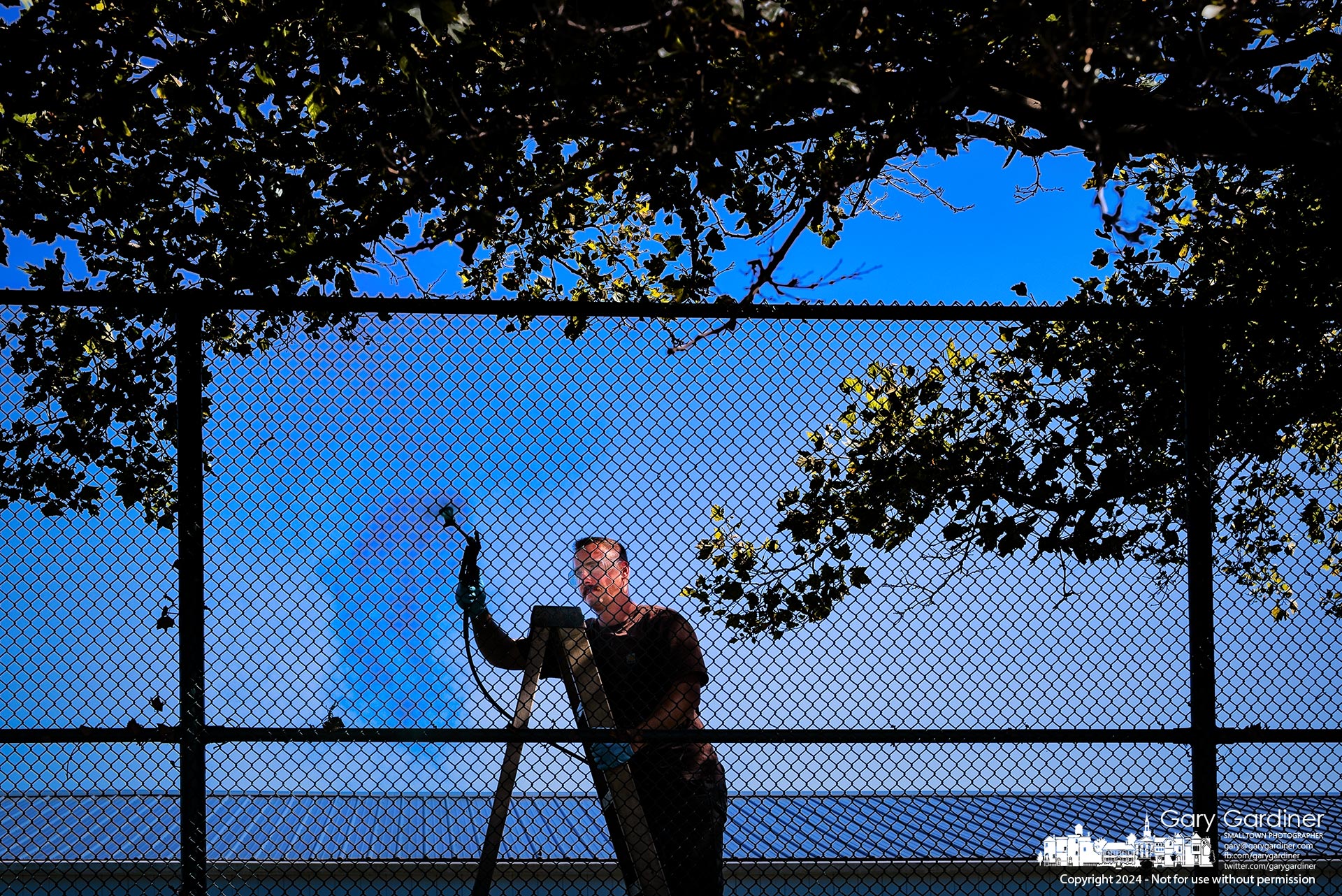 The safety fence along Cooper Road at the Westerville Golf Center gets a fresh coat of paint. My Final Photo for October 3, 2024.