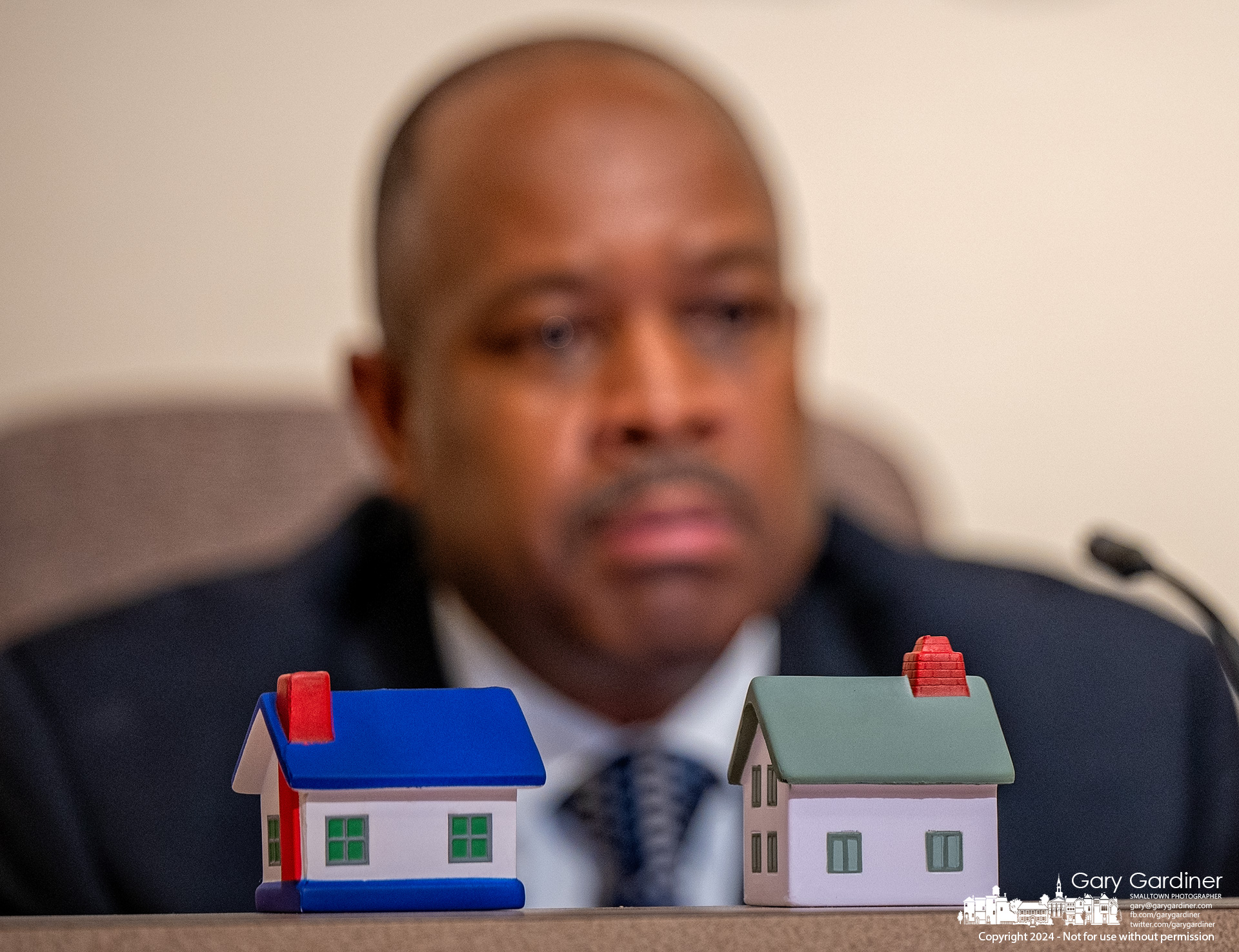 Westerville Kenneth Wright offers comments after placing miniature houses on his desk at the city council meeting, where he has been a proponent for affordable housing in the city. My Final Photo for November 5, 2024.