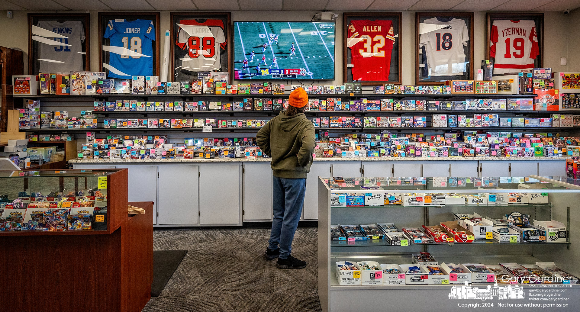 Kenny Stiegele begins his afternoon at Triple Play Card Shop, watching the Buckeyes begin a losing effort against Michigan at Ohio Stadium. My Final Photo for November 30, 2024.