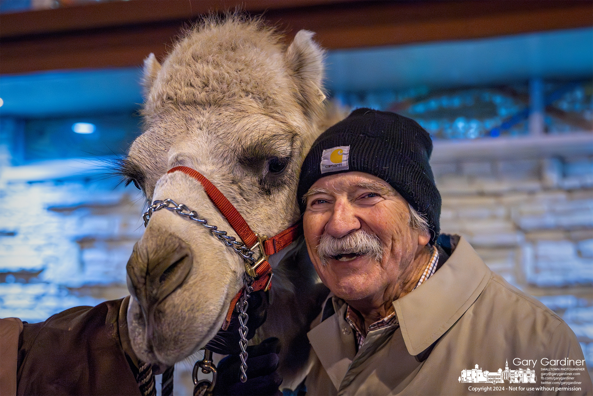 Dave Lilley pauses on his evening rounds to get a closeup portrait with a member of a traveling troupe of shepherds and kings making their way toward a bright star in the sky close to the Church of the Messiah in Uptown. My Final Photo for December 13, 2024.