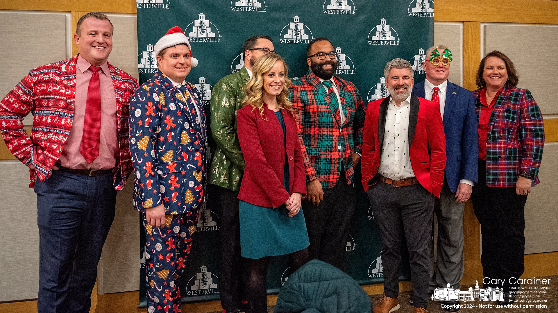 City of Westerville staff wearing their Christmas fashions pose for a photo before the last city council meeting for the year when standard business attire is shed for the once-a-year more festive designs. My Final Photo for December 3, 2024. 