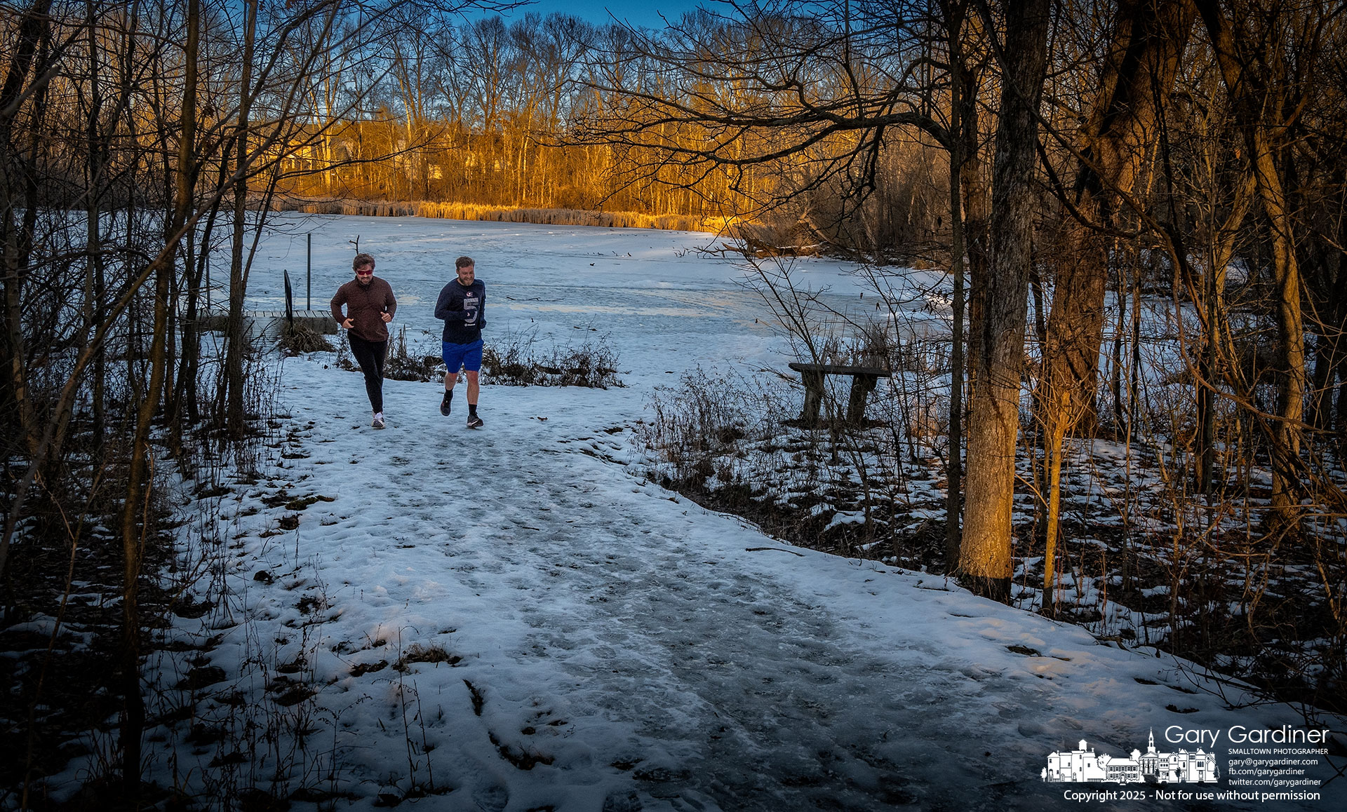 Runners return to the main path after making a loop around Boyer Nature Preserve as a variety of athletes took to sidewalks, roads, and path for exercise with warmer temperatures making the outdoors more hospitable for athletic activities. My Final Photo for January 29, 2025.