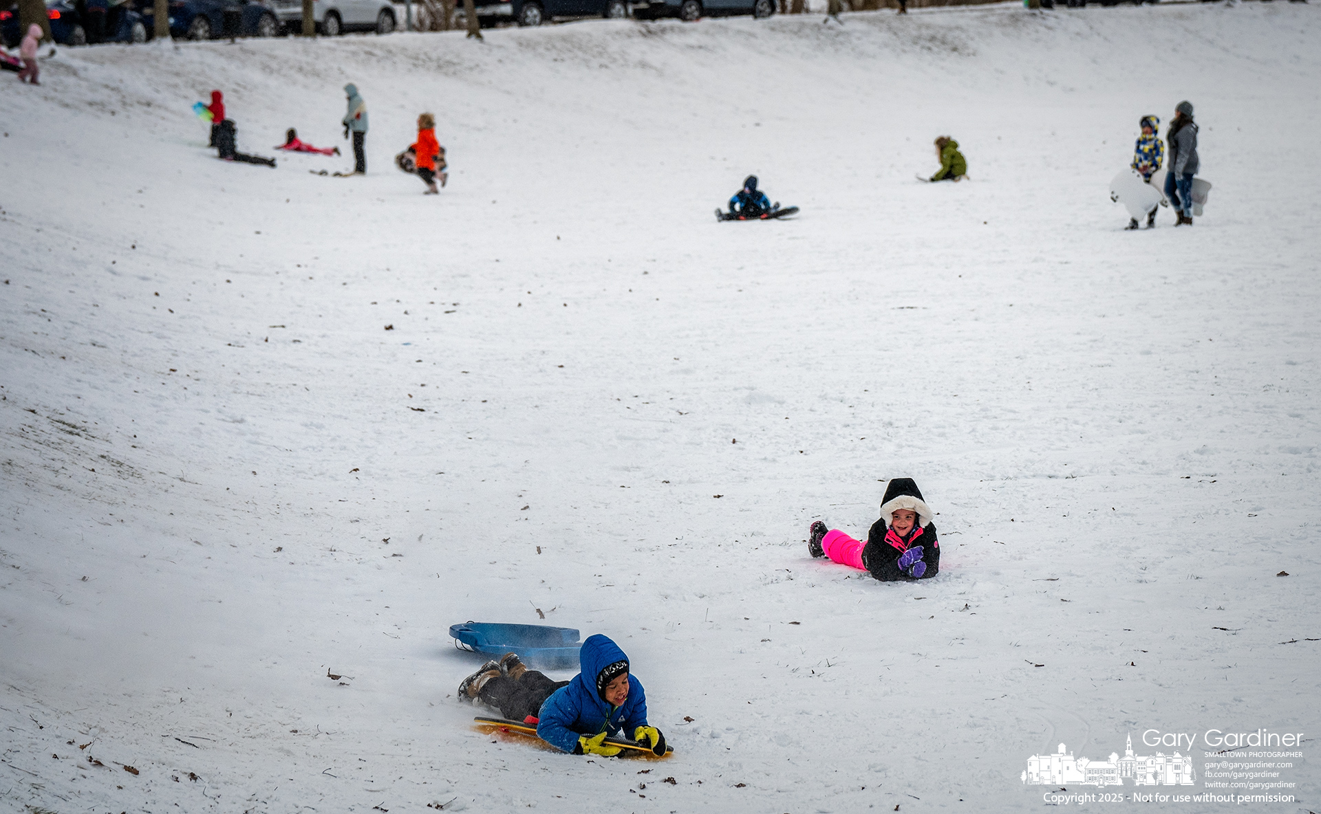 Children, having chosen the smallest hill at Alum Creek Park North, enjoy their brief and less frightful sledding after the winter's first significant snowfall. My Final Photo for January 6, 2025.