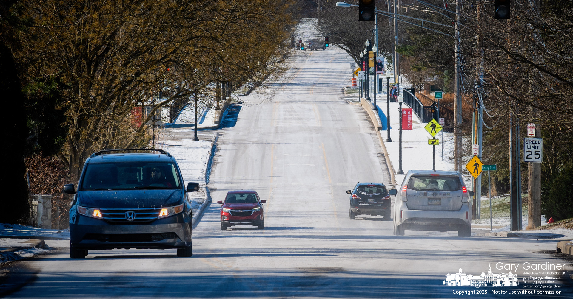 A dusty layer of dried salty brine used to melt snow covers sections of West Main and other streets in Westerville, creating the illusion of a snowy or icy surface. My Final Photo for January 20, 2025.