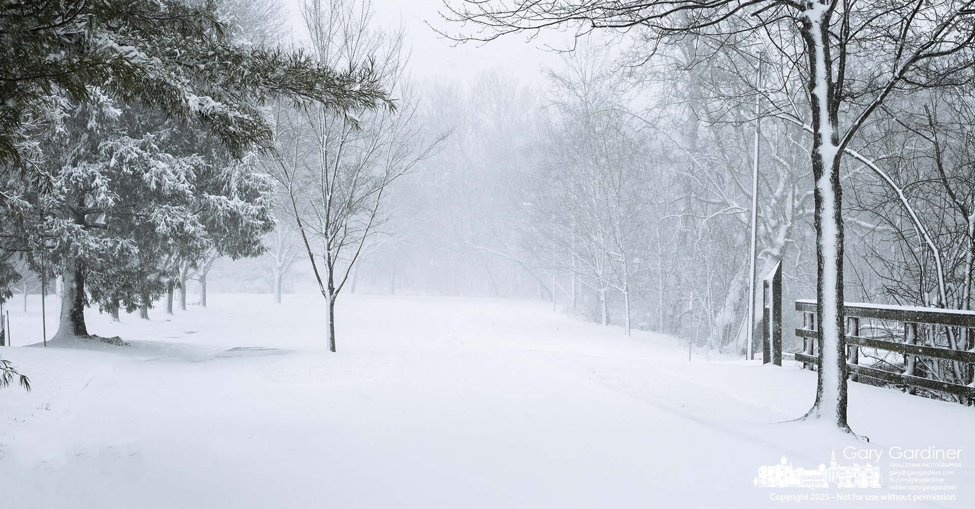 The roadway in Alum Creek Park North near the dam is blanketed in snow and devoid of cars and anglers after an overnight storm brought several inches of snow to Westerville. My Final Photo for February 16, 2025.