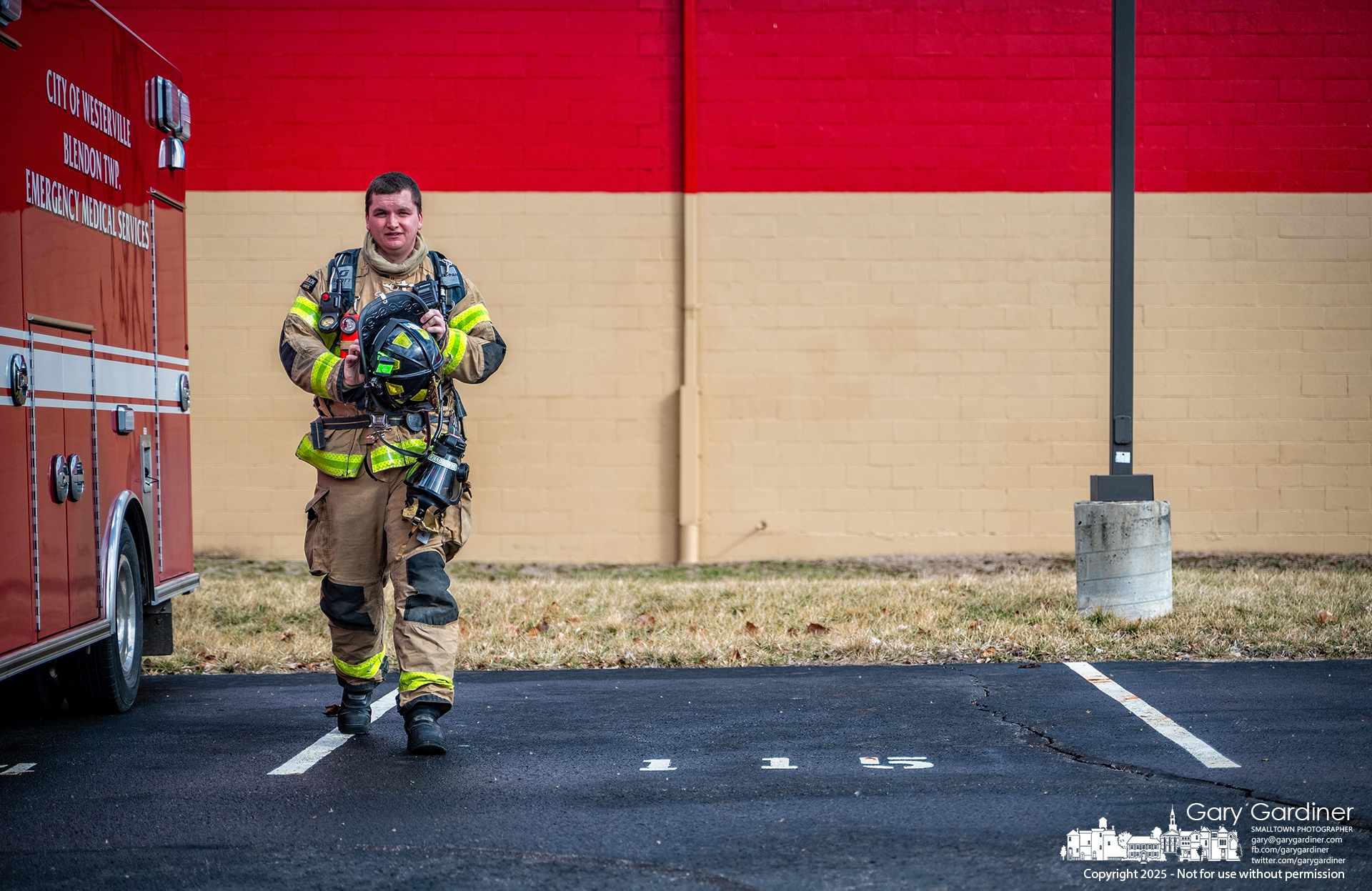 A Westerville firefighter walks from his vehicle to join other firefighters for a training exercise at the former Rouch Honda used car lot on 3C Highway in Blendon Township. My Final Photo for March 5, 2025.