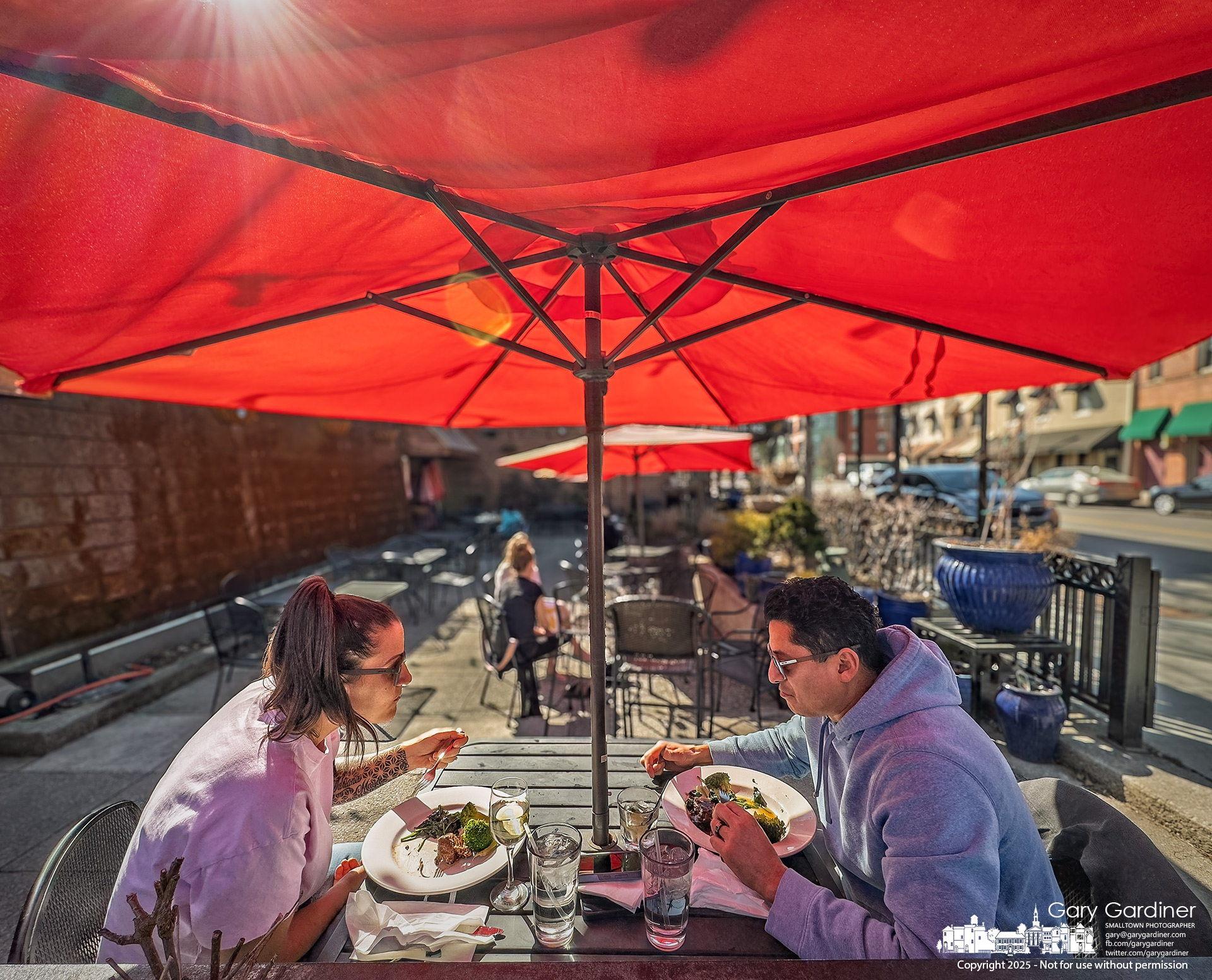 With a warm week ahead and a growing demand for outdoor dining, Jimmy V's in Uptown Westerville on Tuesday welcomed back the iconic red umbrellas. My Final Photo for March 11, 2025.