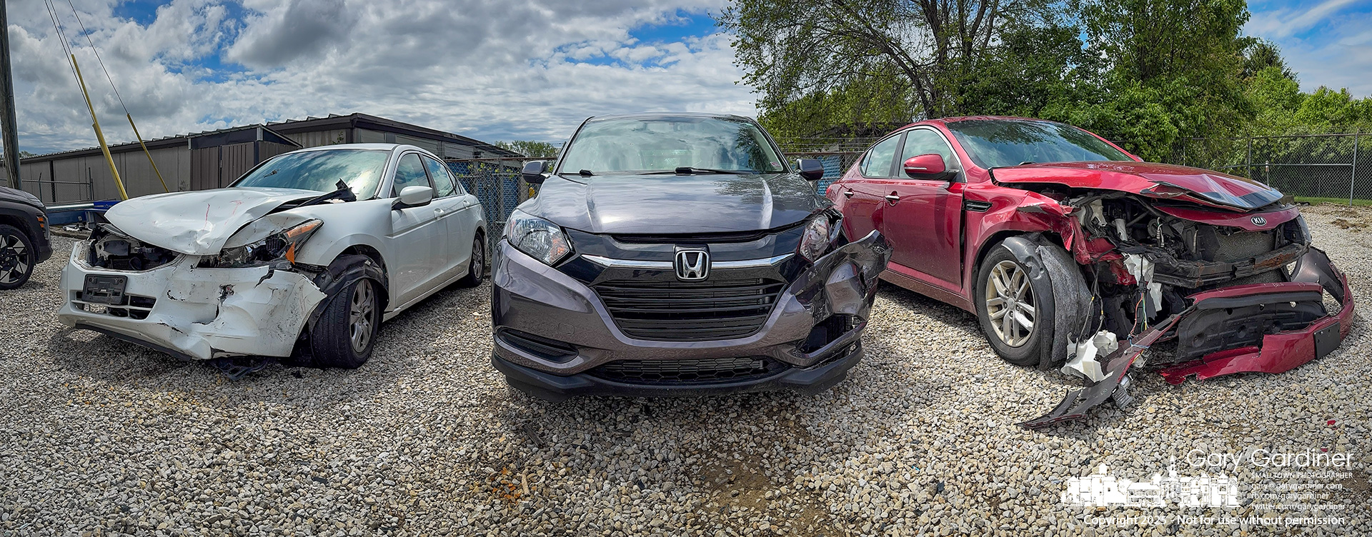 After cleaning out my totaled Honda Accord (left), I stepped back and noticed the other vehicle involved in the crash—also destined for the scrapyard.. My Final Photo for May 5, 2025.