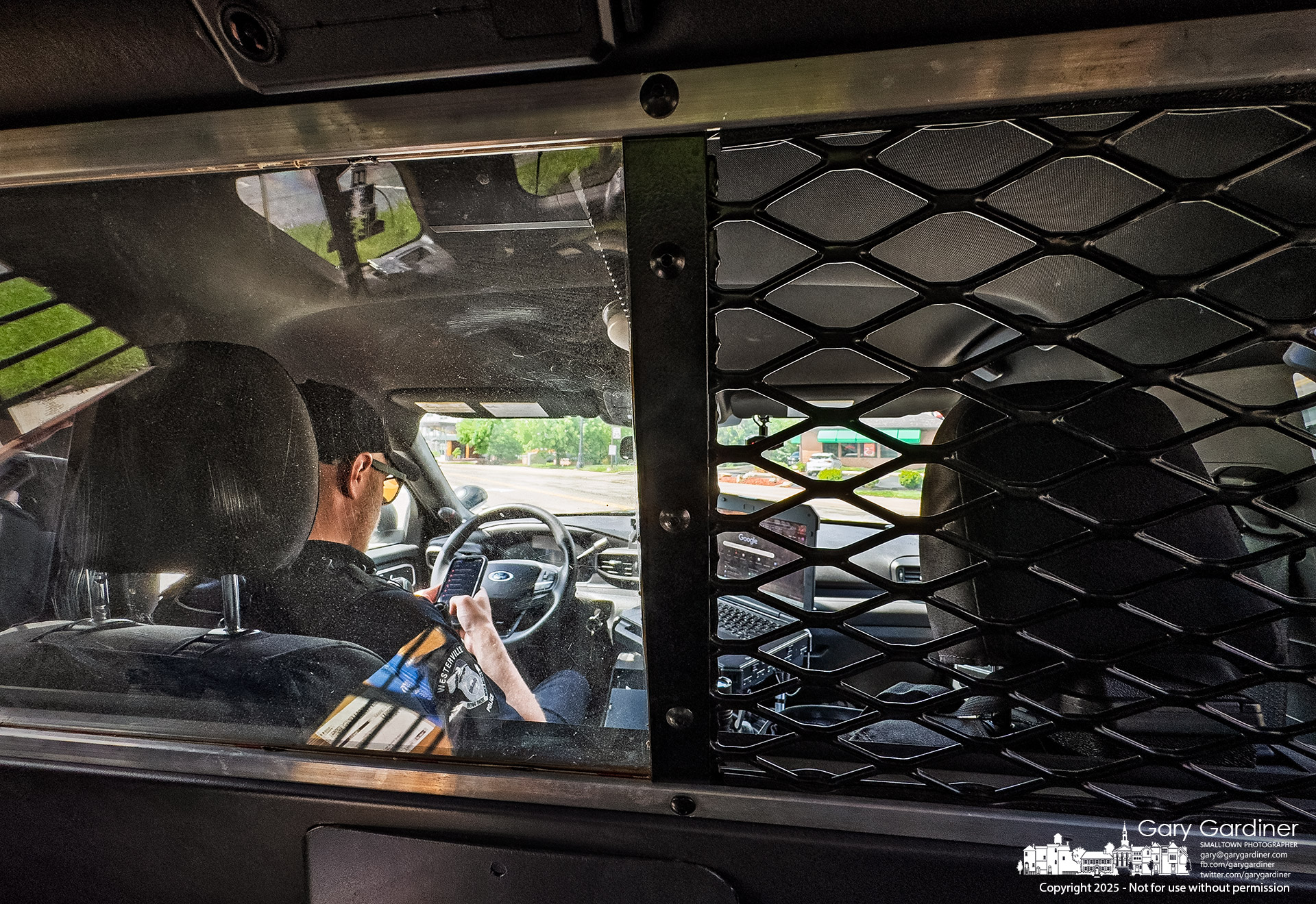 From the back seat of a Westerville Police cruiser, I watched as officers began driving me home—my newly paid-off Honda Civic totaled in a crash at State and Huber. My Final Photo for May 4, 2025.