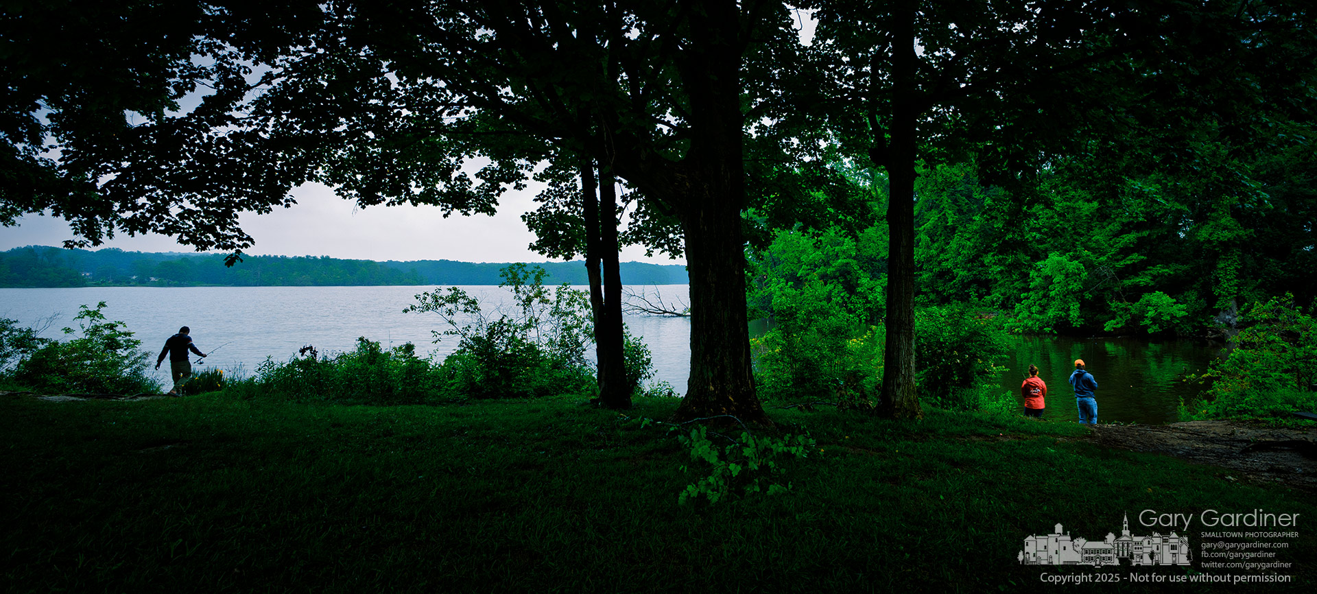 Framed by trees and softened by rain, visitors to Red Bank Park spend a calm afternoon fishing along the edge of Hoover Reservoir. My Final Photo for May 30, 2025.
