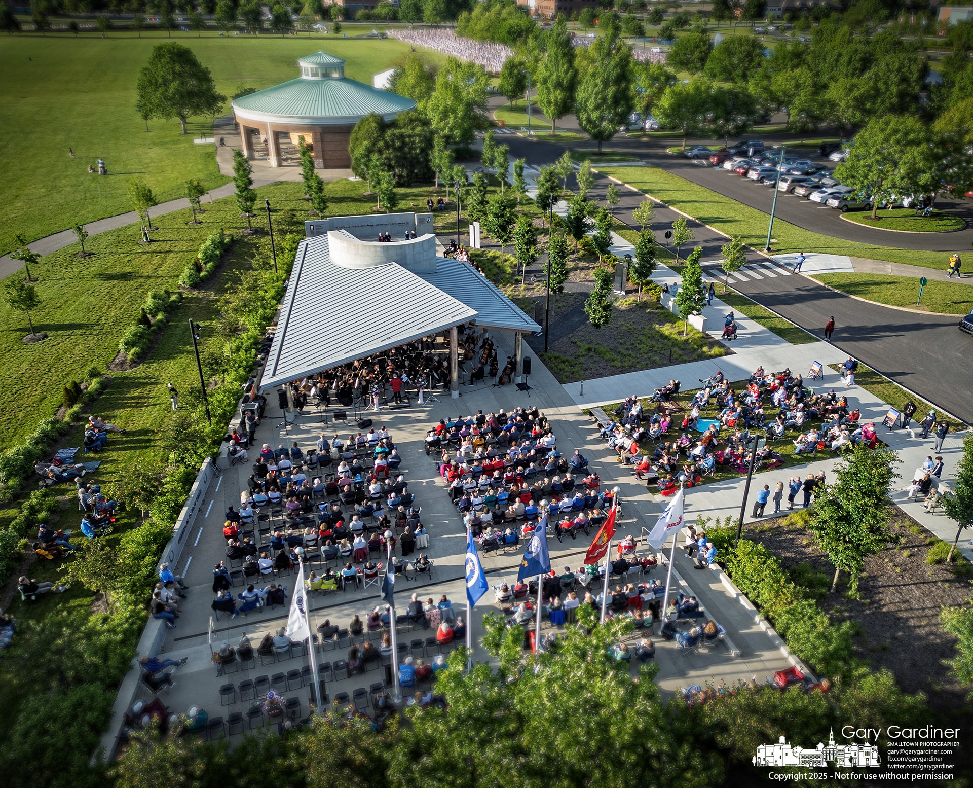 The Westerville Symphony performs a concert of patriotic music at the Veterans Memorial, located several hundred feet from the Field of Heroes flags at the sports complex. My Final Photo for May 24, 2025.