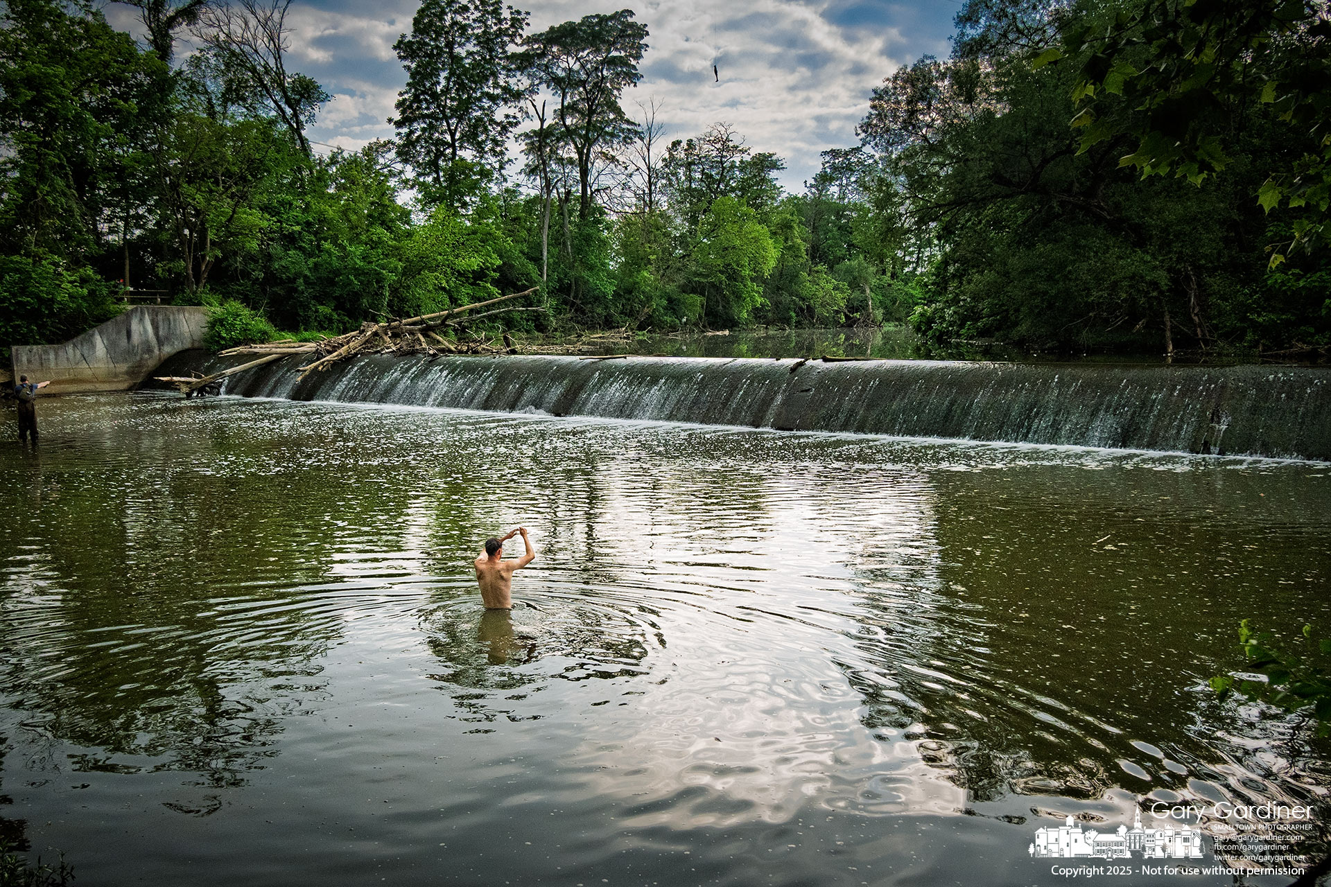 A fisherman wades into the deep waters below the Alum Creek dam to retrieve a favored lure snagged on the creek bottom. My Final Photo for June 8, 2025.