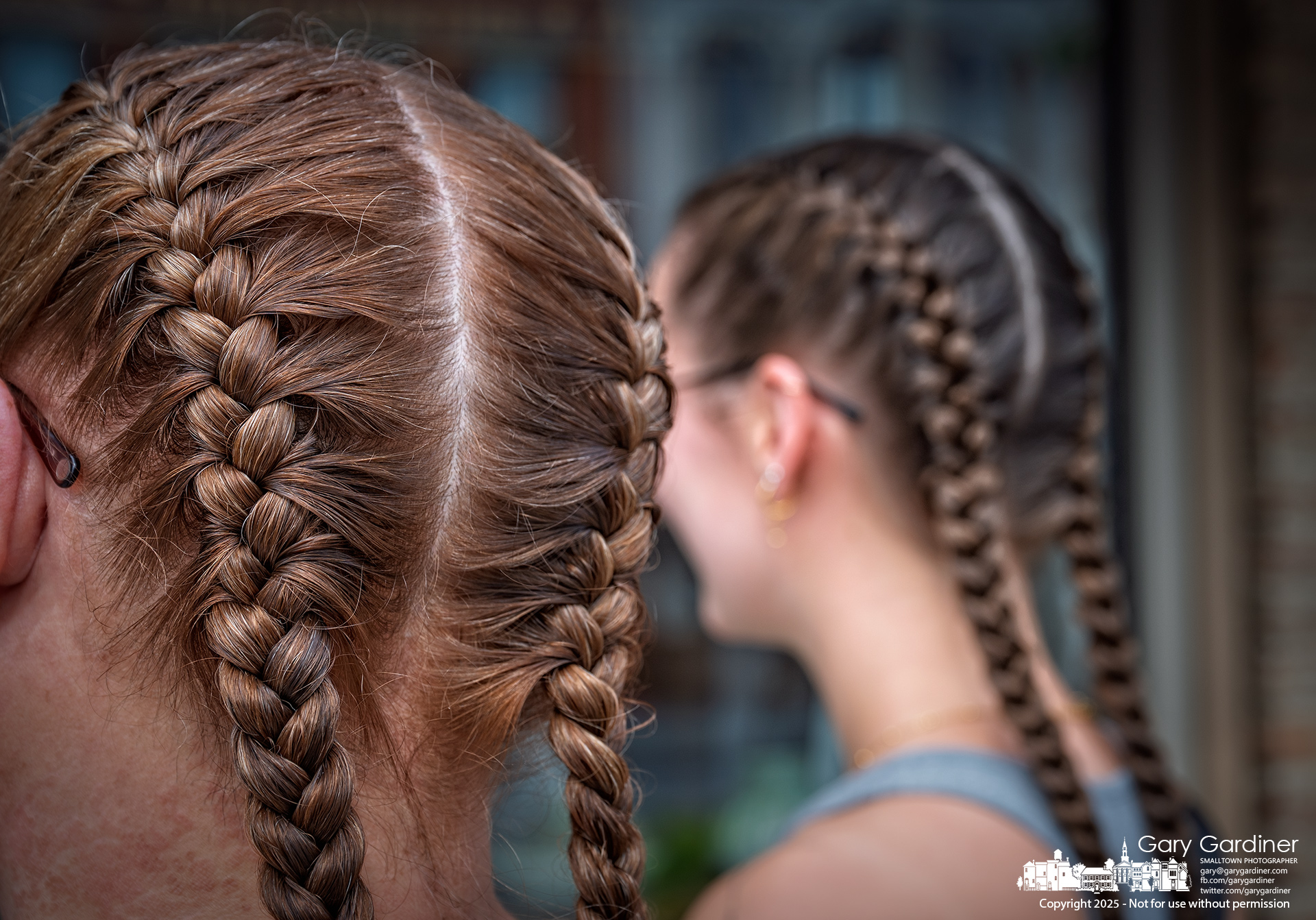 Mother and daughter wear matching braids after a shared session at Studio 359 in Uptown before dining together at Asterisk to celebrate their new look. My Final Photo for June 17, 2025.
