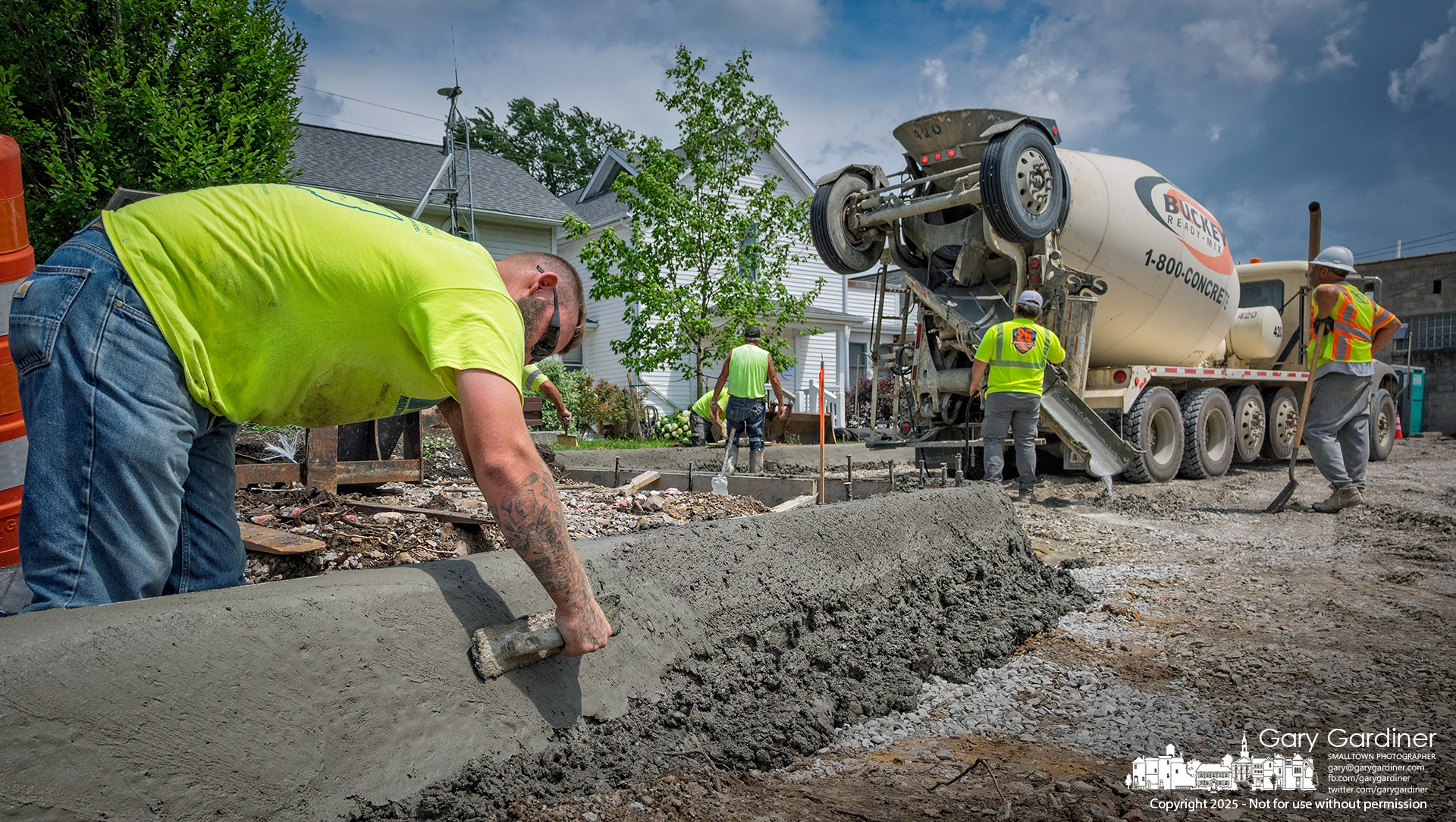 A contractor molds concrete into a curved curb as part of upgrades to Hanby Alley at East Home Street in Uptown Westerville. My final Photo for June 30, 2025.