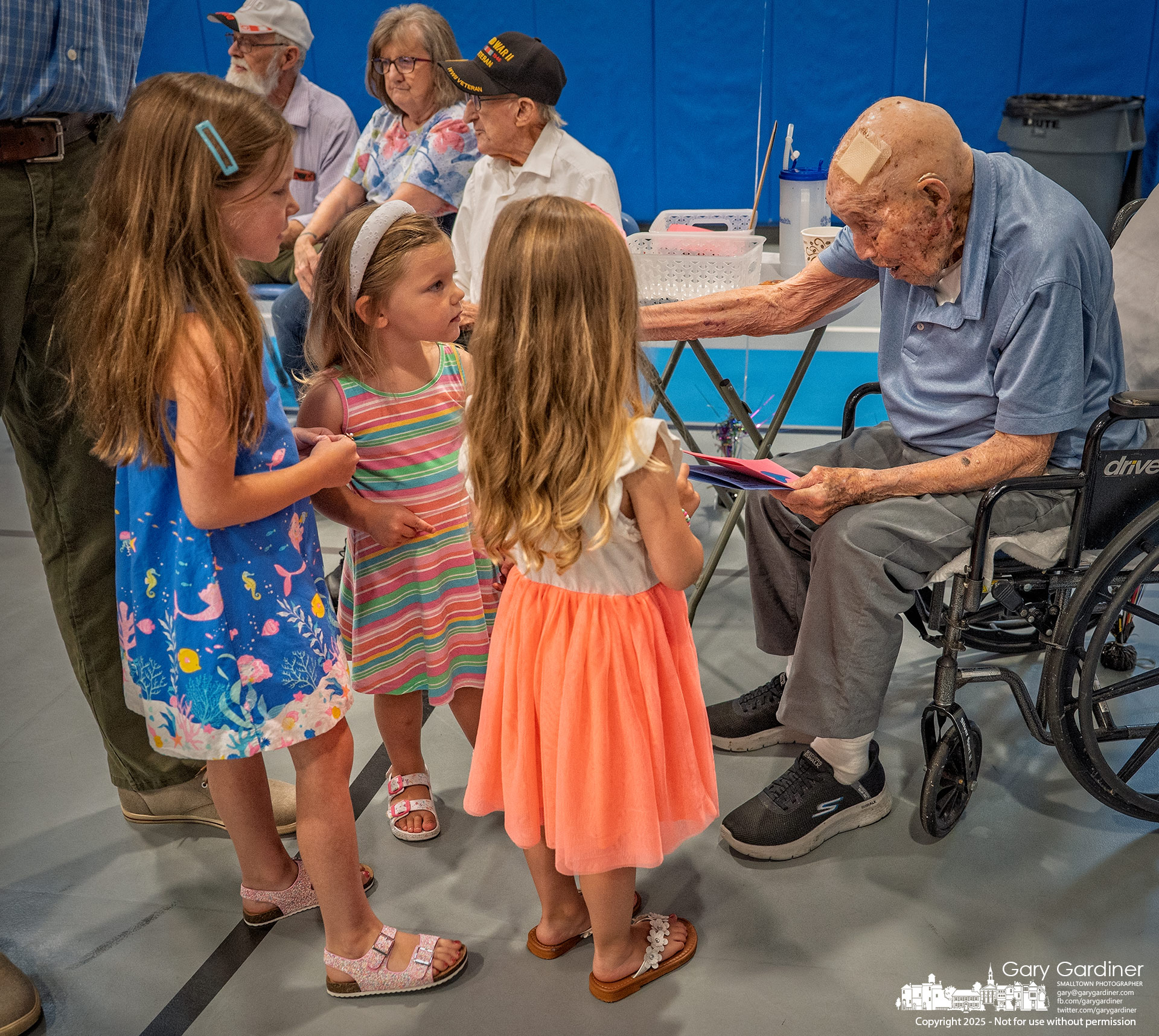 World War II Army veteran Linus Losh, who recently turned 100, thanks three sisters for presenting him with handmade birthday cards during a reception at St. Paul the Apostle Catholic Church on Sunday morning. My Final Photo for July 20, 2025.
