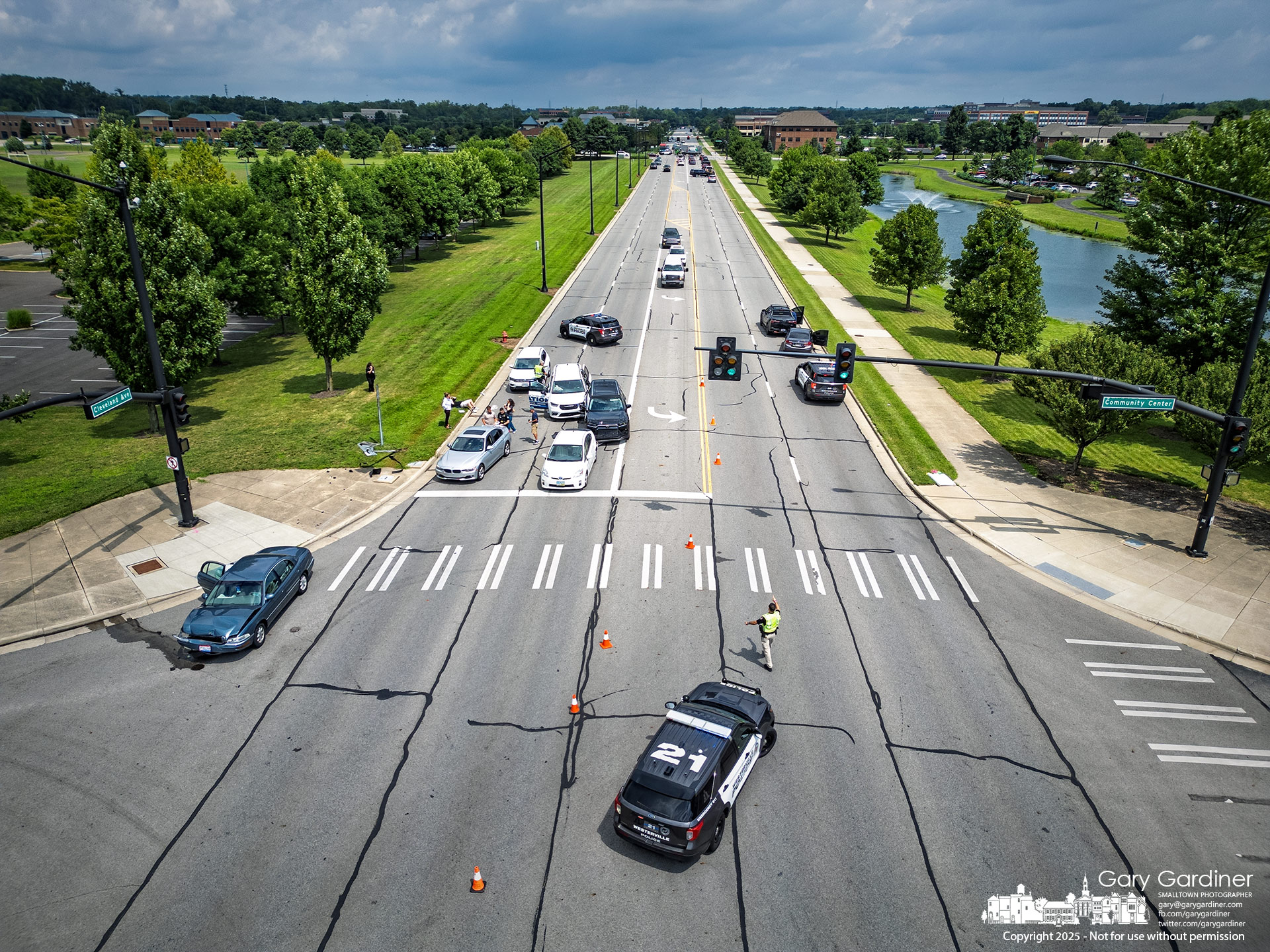Portions of Cleveland Avenue in front of the Community Center were shut down Monday after a two-car crash followed a five-car crash near the entrance to the center. My Final Photo for July 28, 2025.