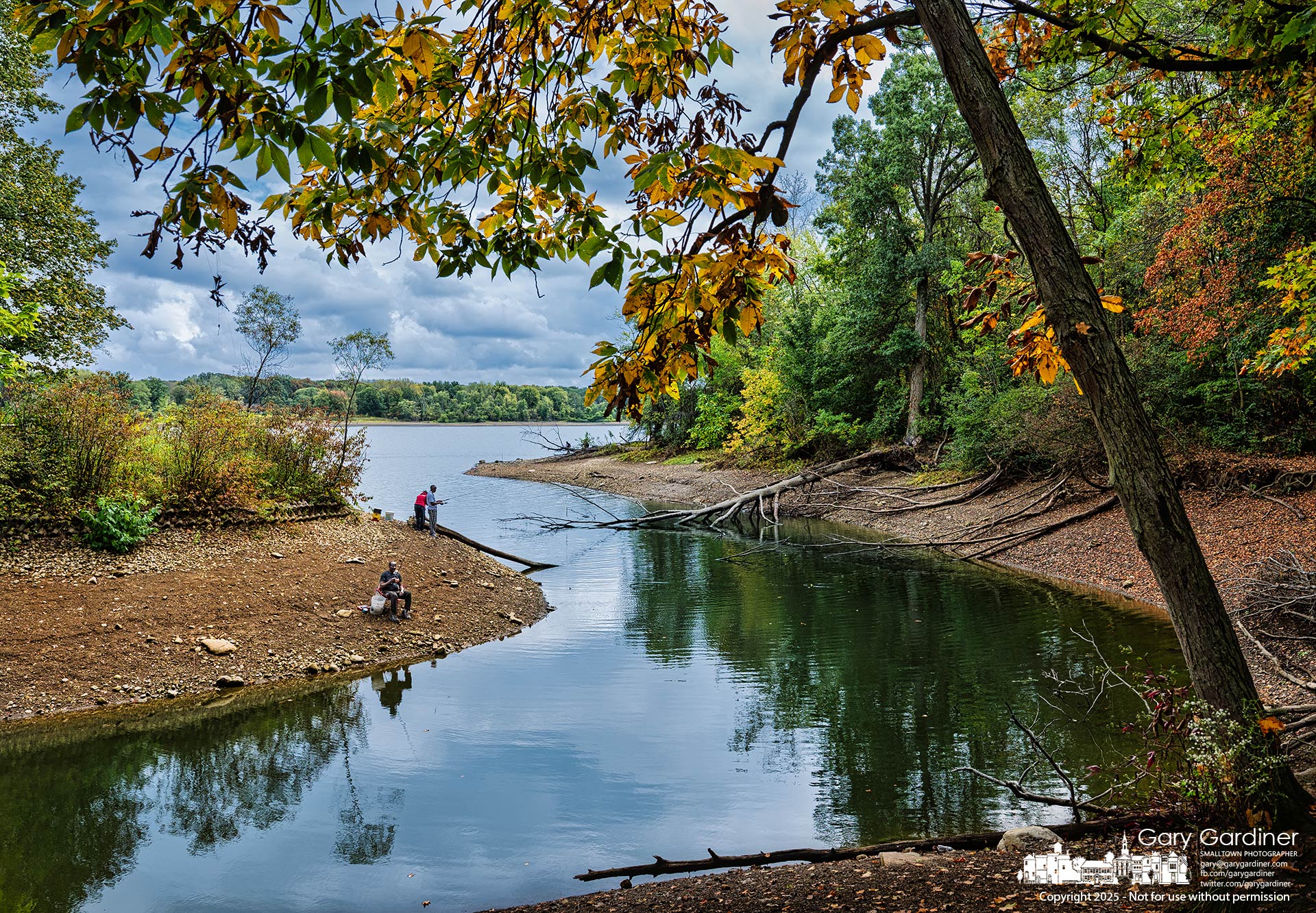 Three fishermen cast their bait into the small inlet at Red Bank Marina, where evidence of the lower lake level is most obvious for frequent visitors. My Final Photo for September 24, 2025.