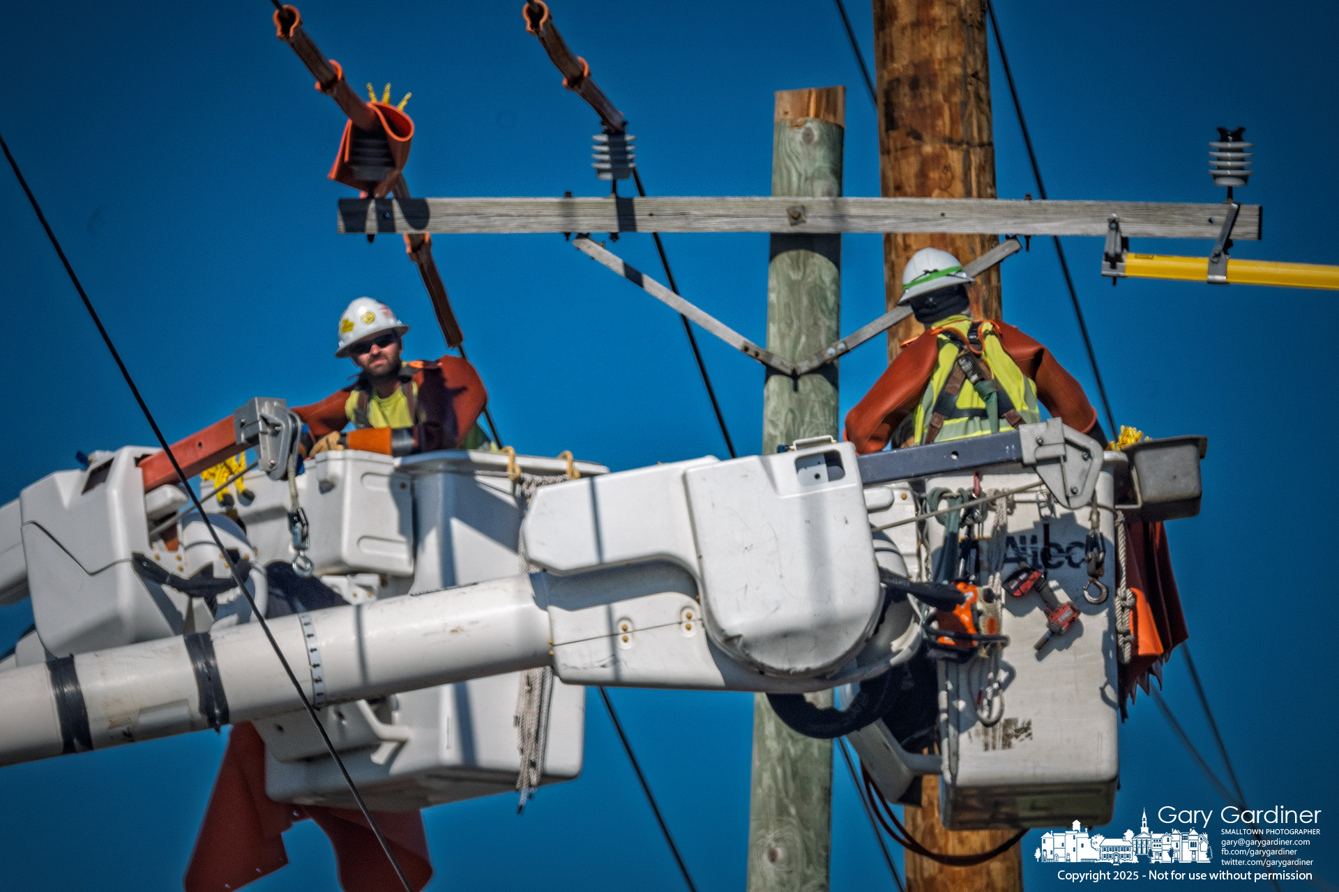 AEP linemen transfer high-voltage lines from an aging utility pole to a new one along 3C Highway just north of Westerville on Tuesday. My Final Photo for October 28, 2025.