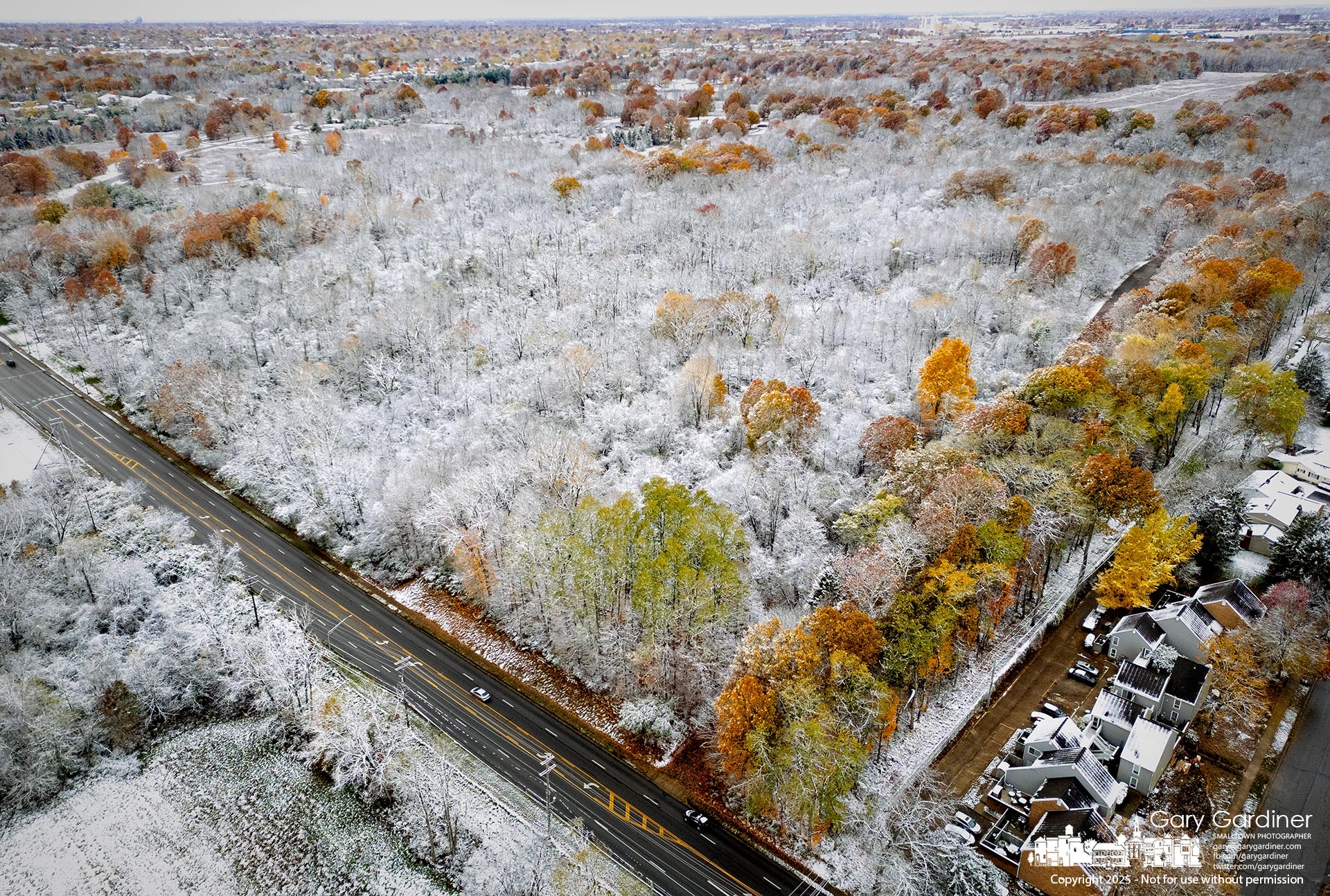 Scattered maples and other deciduous trees retain their fall color through the season’s first snowfall at Sharon Woods Metro Park. My Final Photo for November 10, 2025.