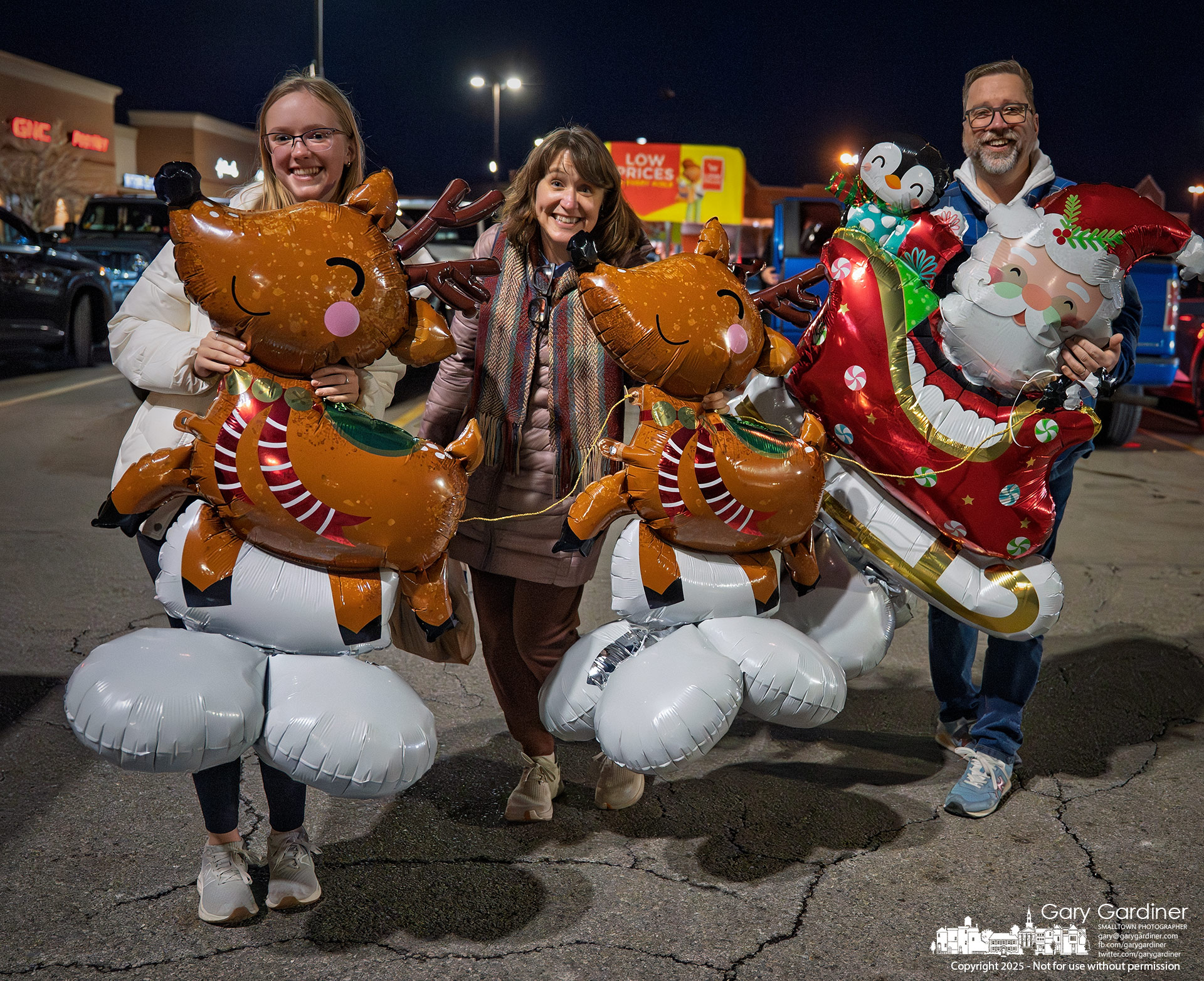 Dwight Heckelman and his family show off the bargain inflated Santa and reindeer they bought at a grocery store Sunday night. My Final Photo for December 21, 2025.