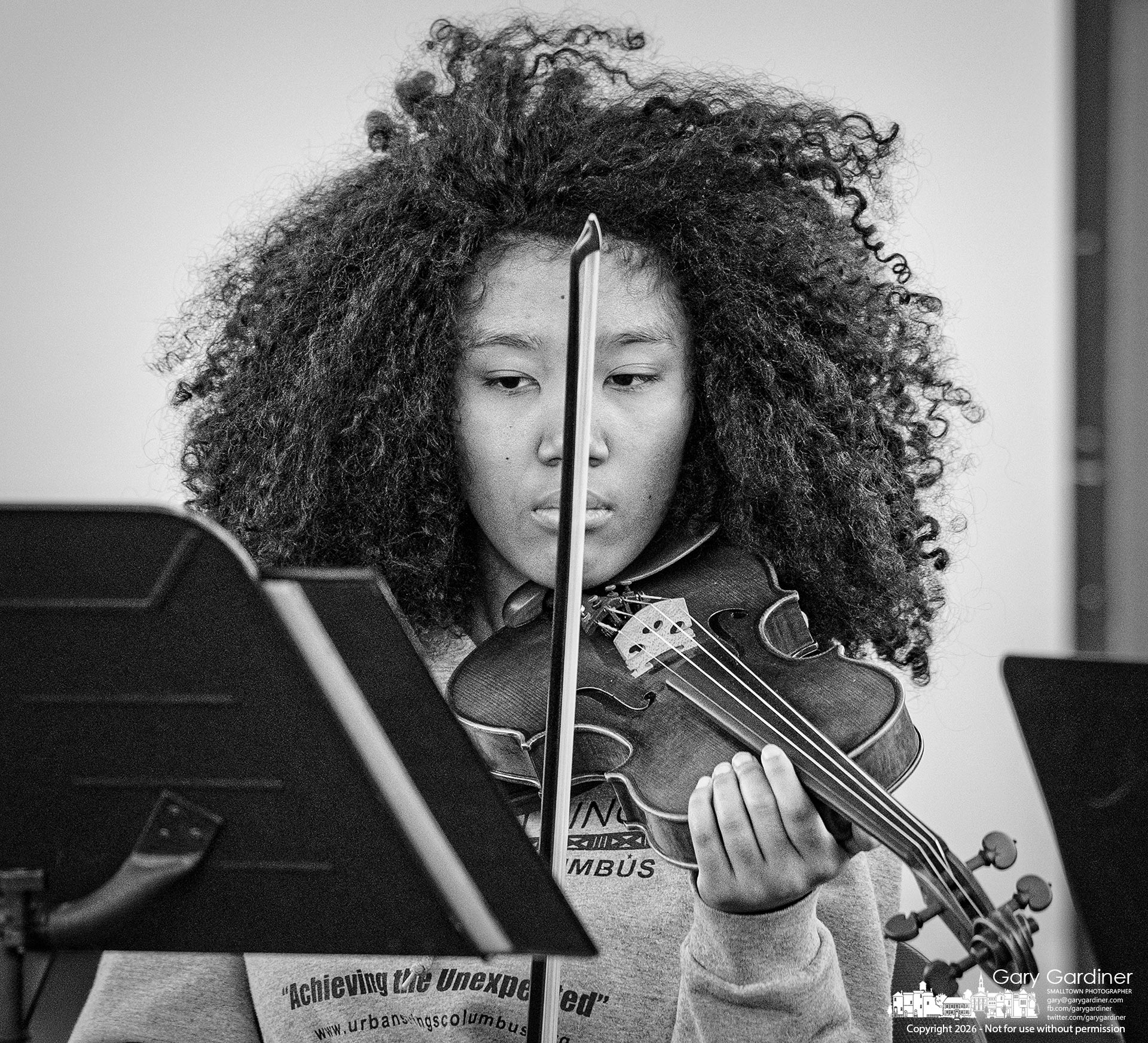 An Urban Strings Youth Orchestra violinist sets herself for the opening of the group's next piece of music at a performance at the Westerville Public Library. (My Final Photo for February 7, 2026)