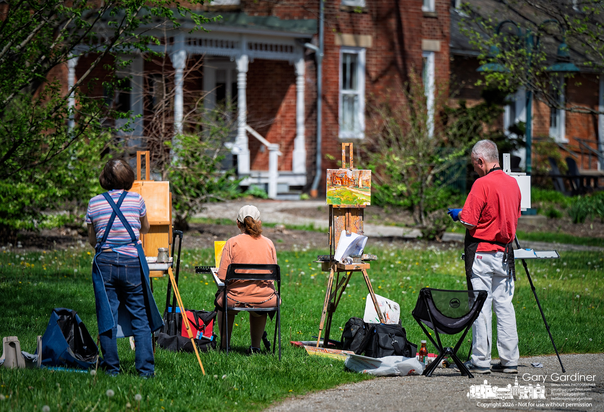 Plein air artists gather to paint the grounds and buildings at Heritage Park Thursday afternoon. (My Final Photo for April 16, 2026)