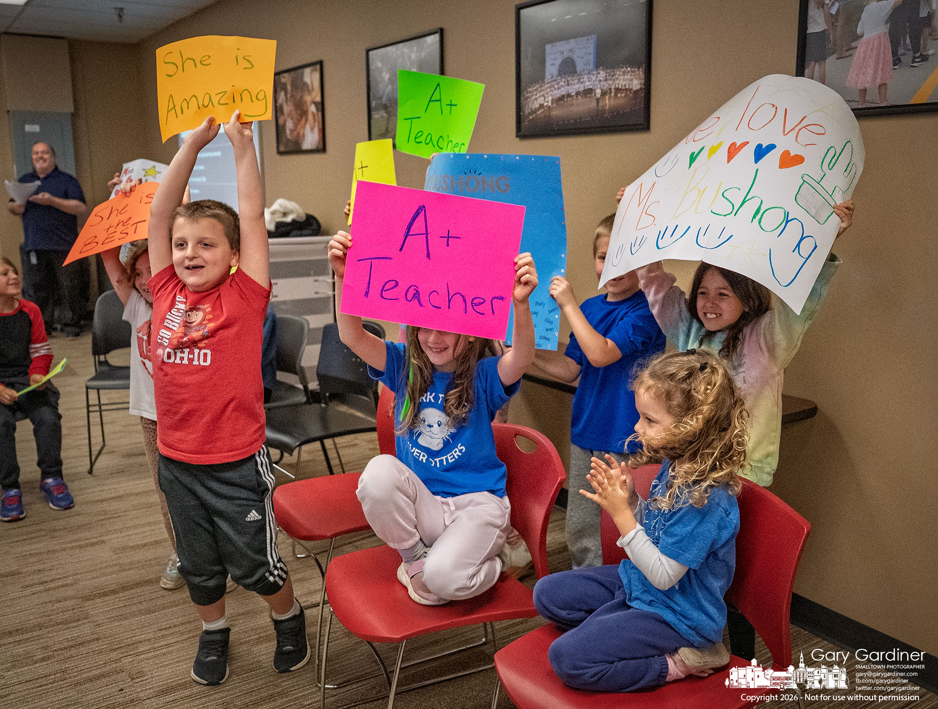 Students at Mark Twain Elementary, led by teacher Libby Bushong, celebrate as she is recognized as an A+ Award recipient at Monday night's Westerville School Board meeting. (My Final Photo for April 6, 2026)