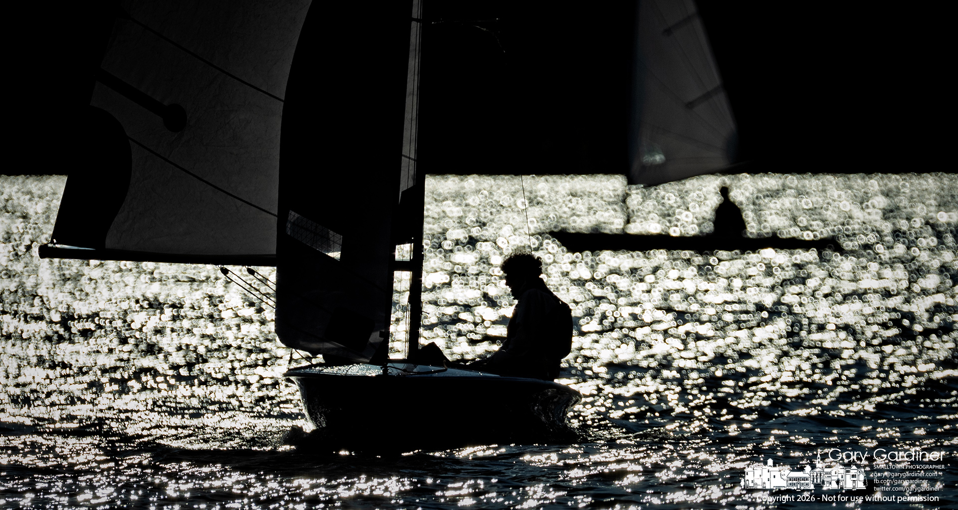 Sailors return to the dock at Hoover Sailing Club after finishing the last practice session of the season before the summer series of competitions. (My Final Photo for May 7, 2026. Photo by Gary Gardiner)