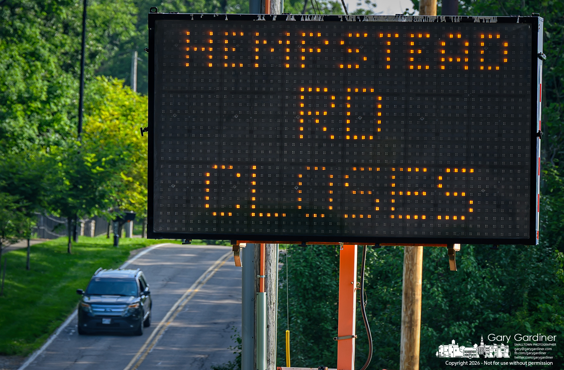 A road closing sign warns motorists that Hempstead Road will be closed between Schrock Road and South Spring starting July 6 for repairs to the bridge over a small creek. (My Final Photo for June 30, 2026. Photo by Gary Gardiner)