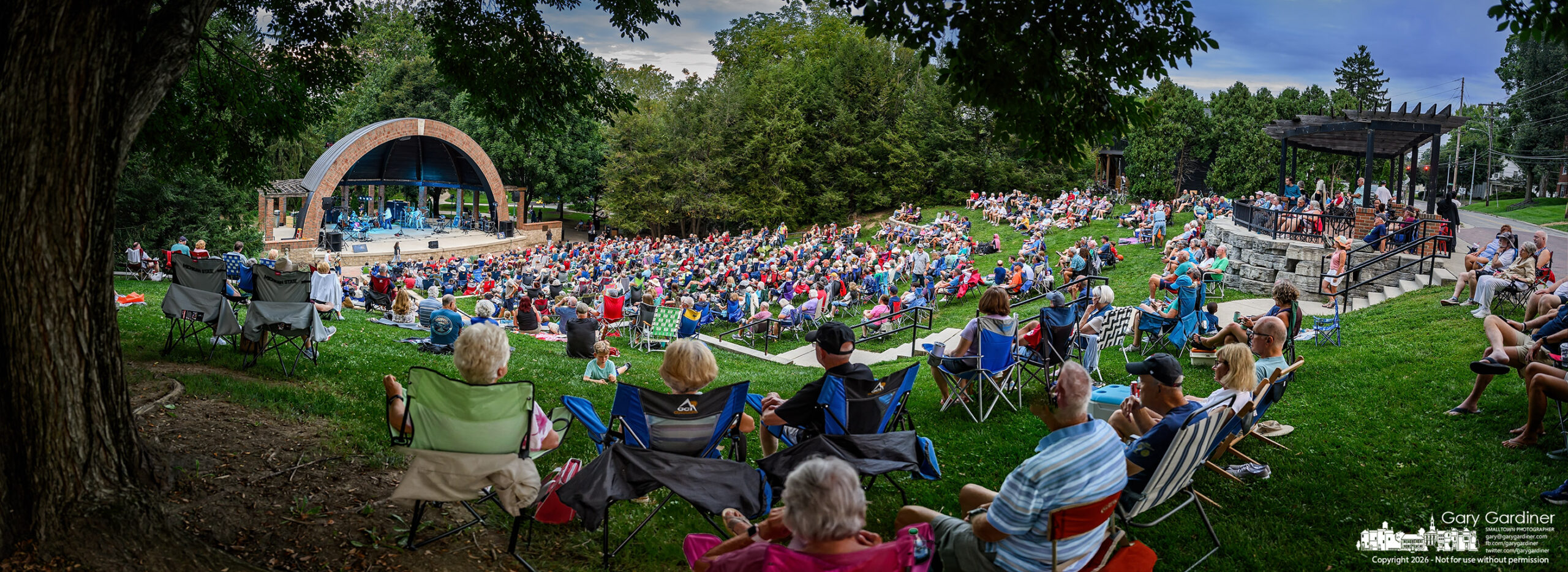A large crowd listens to Turn to Stone, an ELO Tribute Band, at the last Alum Creek Park Amphitheater Sunday concert for 2026. (My Final Photo for August 30, 2026. Photo by Gary Gardiner)